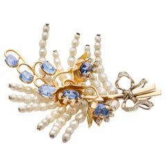 Broche de oro amarillo y blanco de 18 quilates con zafiro de 9,82 quilates, perla y diamantes de 0,16 quilates