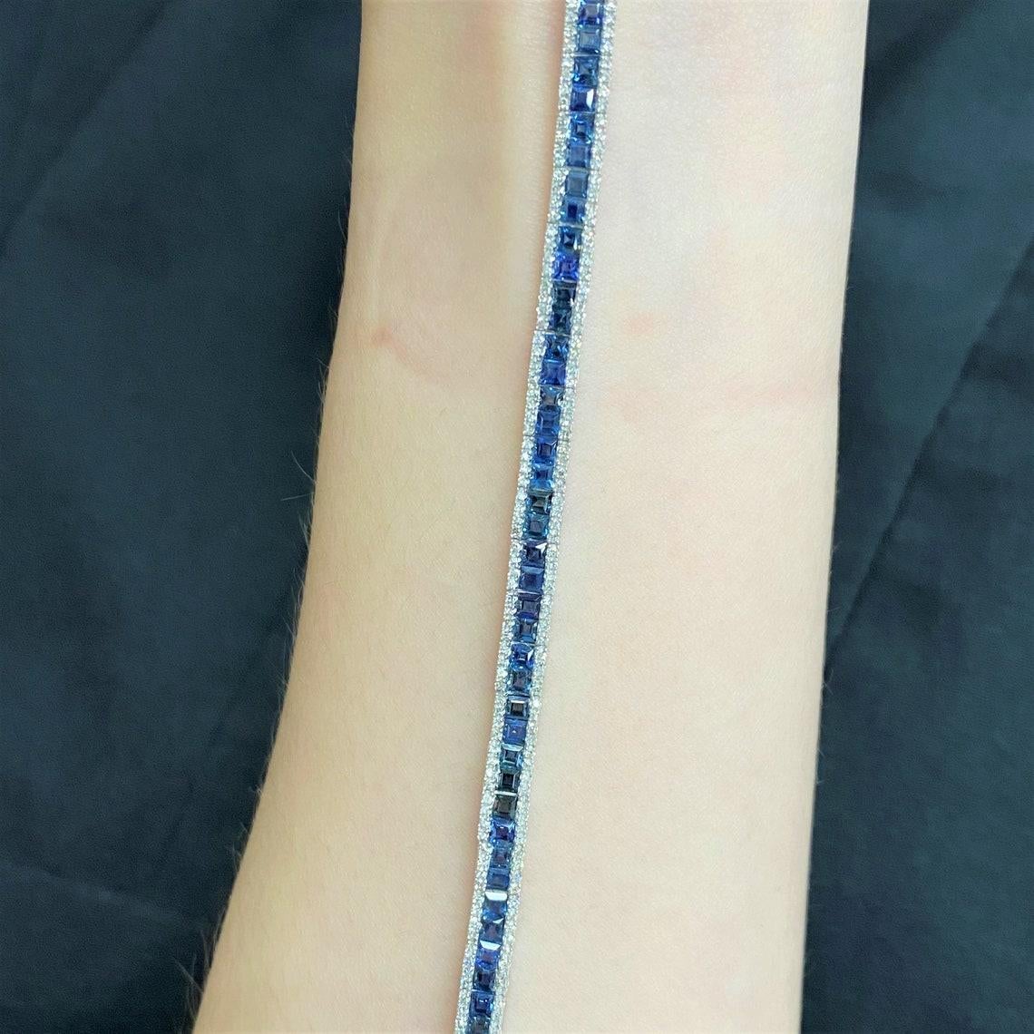 The Following Item we are offering is this Beautiful Rare Important 18KT Gold Deco Style Sparkling Princess Cut Blue Sapphire and Diamond Bracelet. FEATURING Magnificent Rare Gorgeous Fancy Princess Cut Blue Sapphires Framed with Diamonds!!! 
The