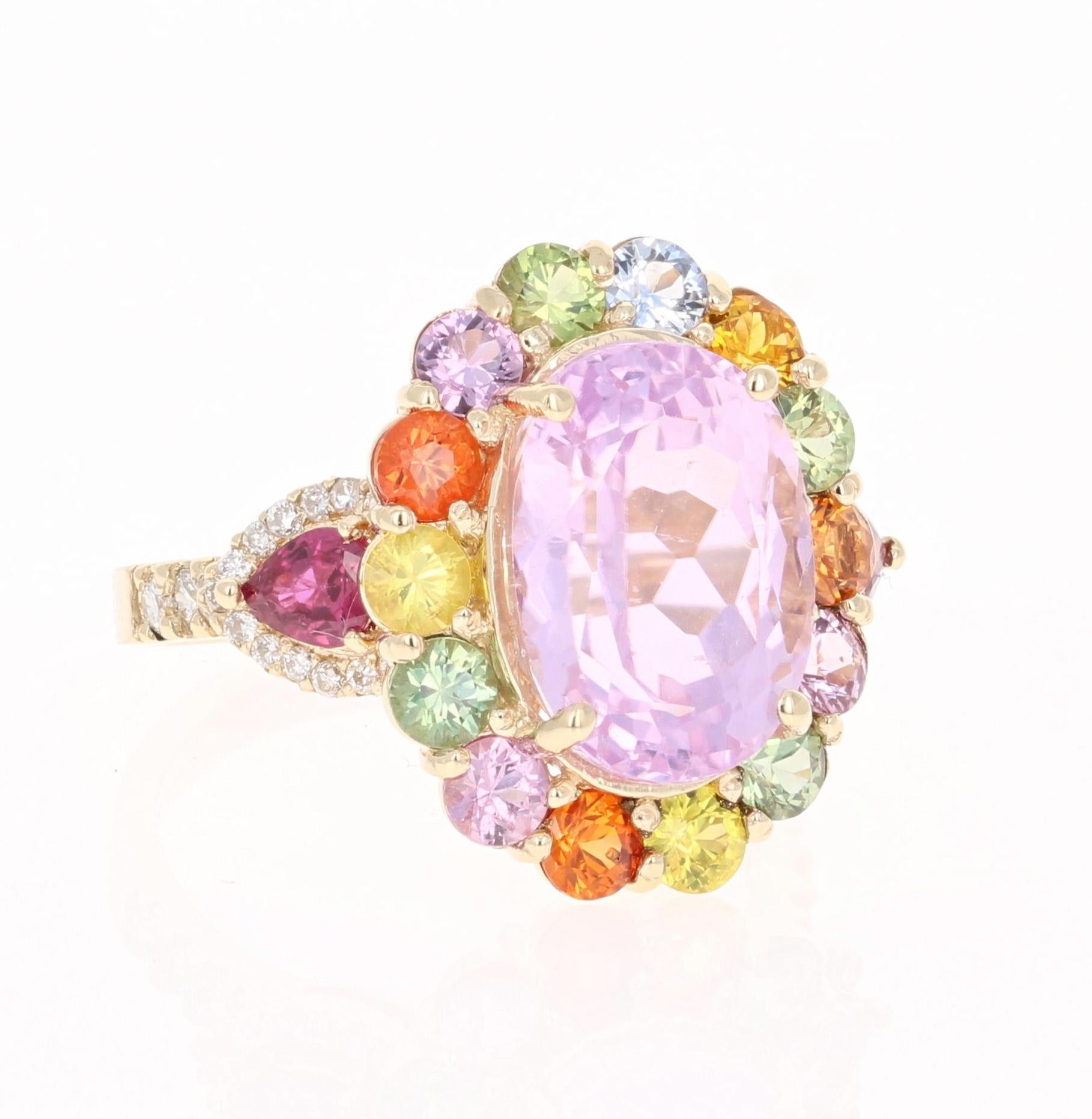 Super gorgeous and uniquely designed 9.81 Carat Kunzite and Multi-Colored Sapphire Diamond 14K Yellow Gold Cocktail Ring!

This ring has a 6.81 carat Oval Cut Pinkish-Mauve Kunzite and is elegantly surrounded by 14 Round Cut Multi-Colored Sapphires