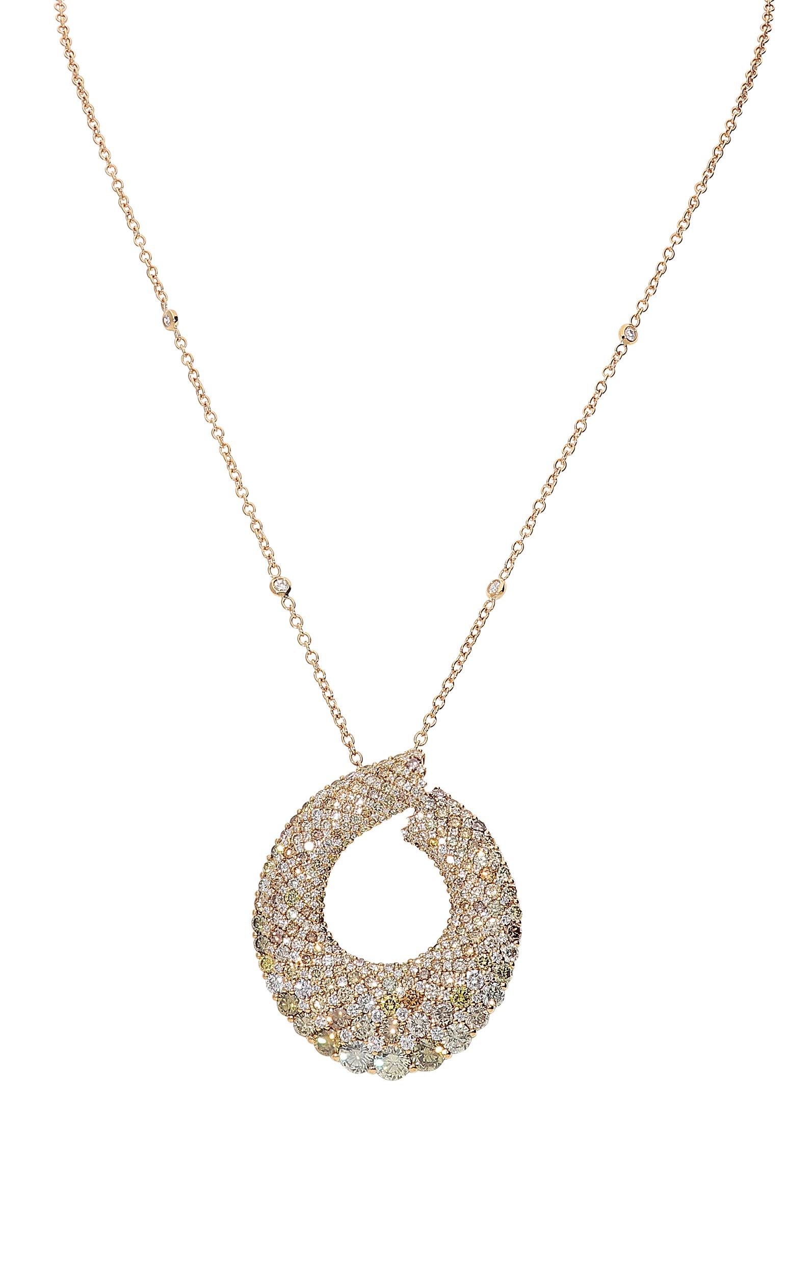 Elegant necklace in 18kt pink gold for 16,50 grams with 8,11 carats of Multibrown round brilliant diamonds and 1,76 carats of white round brilliant diamonds color G clarity SI.
The drop element has got 3.50 centimeters of width, 4,50 centimeters of