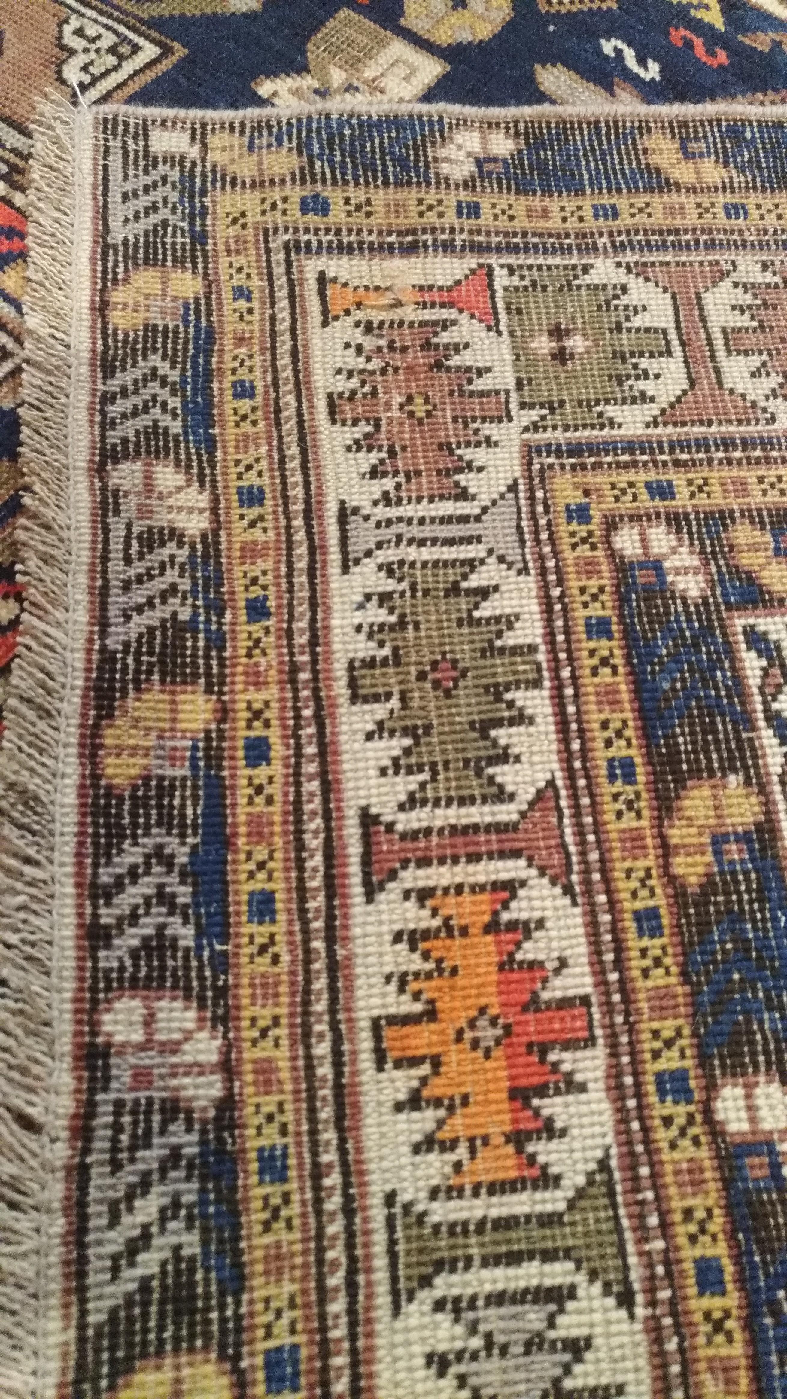 987 - Beautiful 19th century Caucasian carpet Conagand with a geometric design and beautiful colors, entirely hand knotted with wool velor on a wool basis.
 