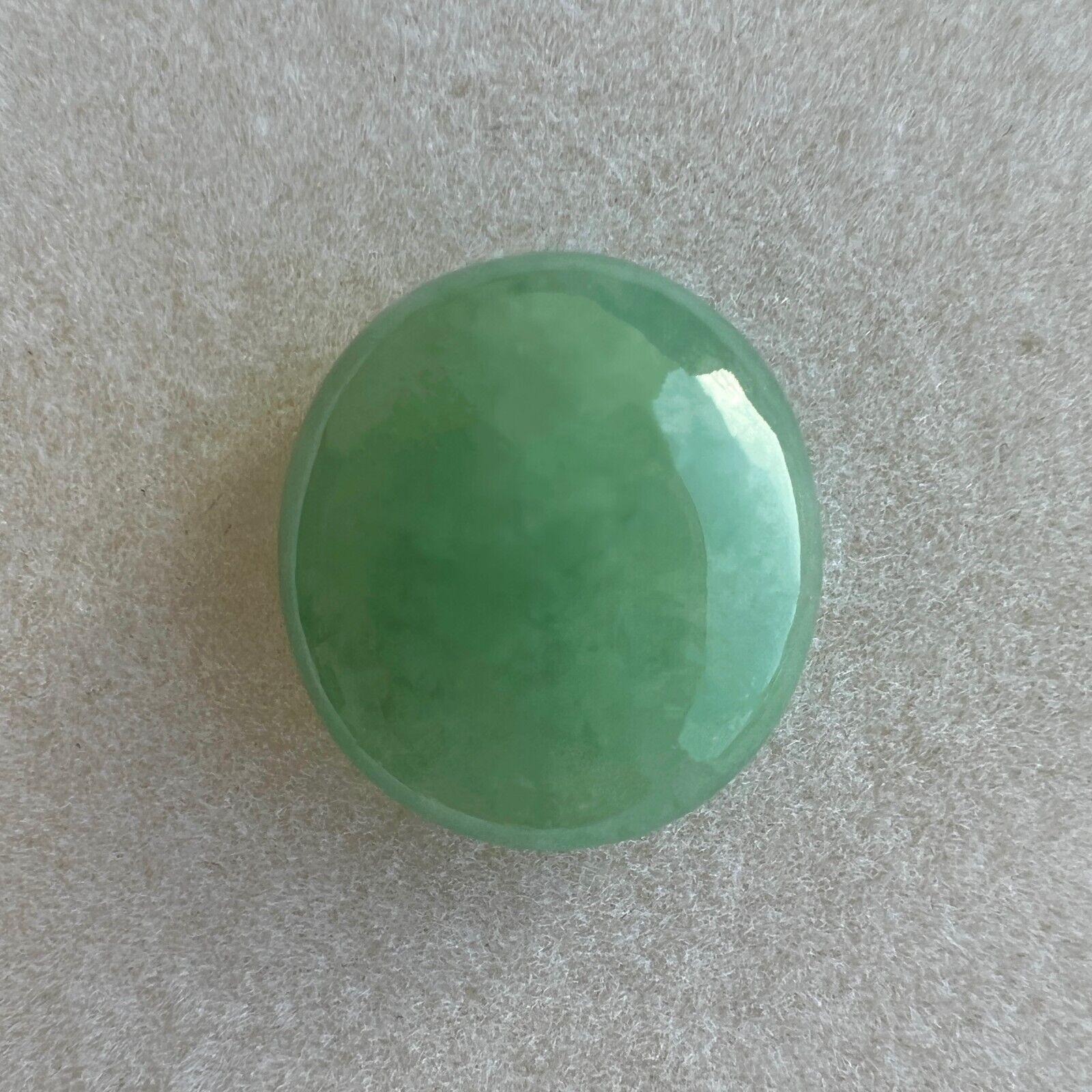9.87ct Green Jadeite Jade IGI Certified Natural ‘A’ Grade Oval Cabochon Gem

IGI Certified Untreated A Grade Green Jadeite Gemstone.
9.87 Carat with an excellent oval cabochon cut and bright green colour. Fully certified by IGI in Antwerp confirming