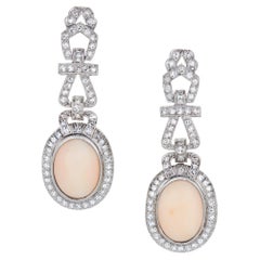 9.89 Carat Oval Shaped Angel Skin Coral and Diamond Earrings in Platinum