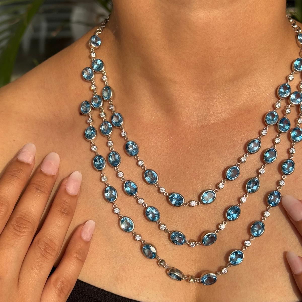 Taille ovale 98.94 Carat Blue Topaz & Zircon Three Strand Opera Length Necklace in 925 Silver en vente