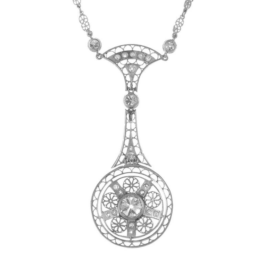 EGL certified Victorian 1900 handmade filigree drop pendant necklace. This timeless piece is adorned with a .99ct center stone that is certified by the EGL as near colorless and accented by 20 old European cut diamonds totaling .52cts. and completed