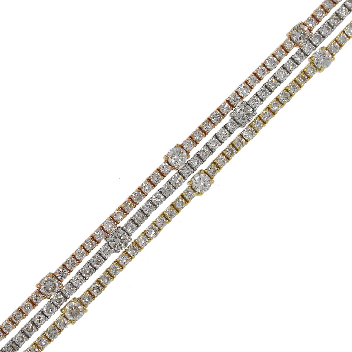 Material: 18k White Gold, 18k Rose Gold, 18k Yellow Gold
Diamond Details: Approximately 9.90ctw round brilliant diamonds. Diamonds are H/I in color and SI1 in clarity.
Clasp: Tongue in box clasp with safety latch
Total Weight: 22.1g