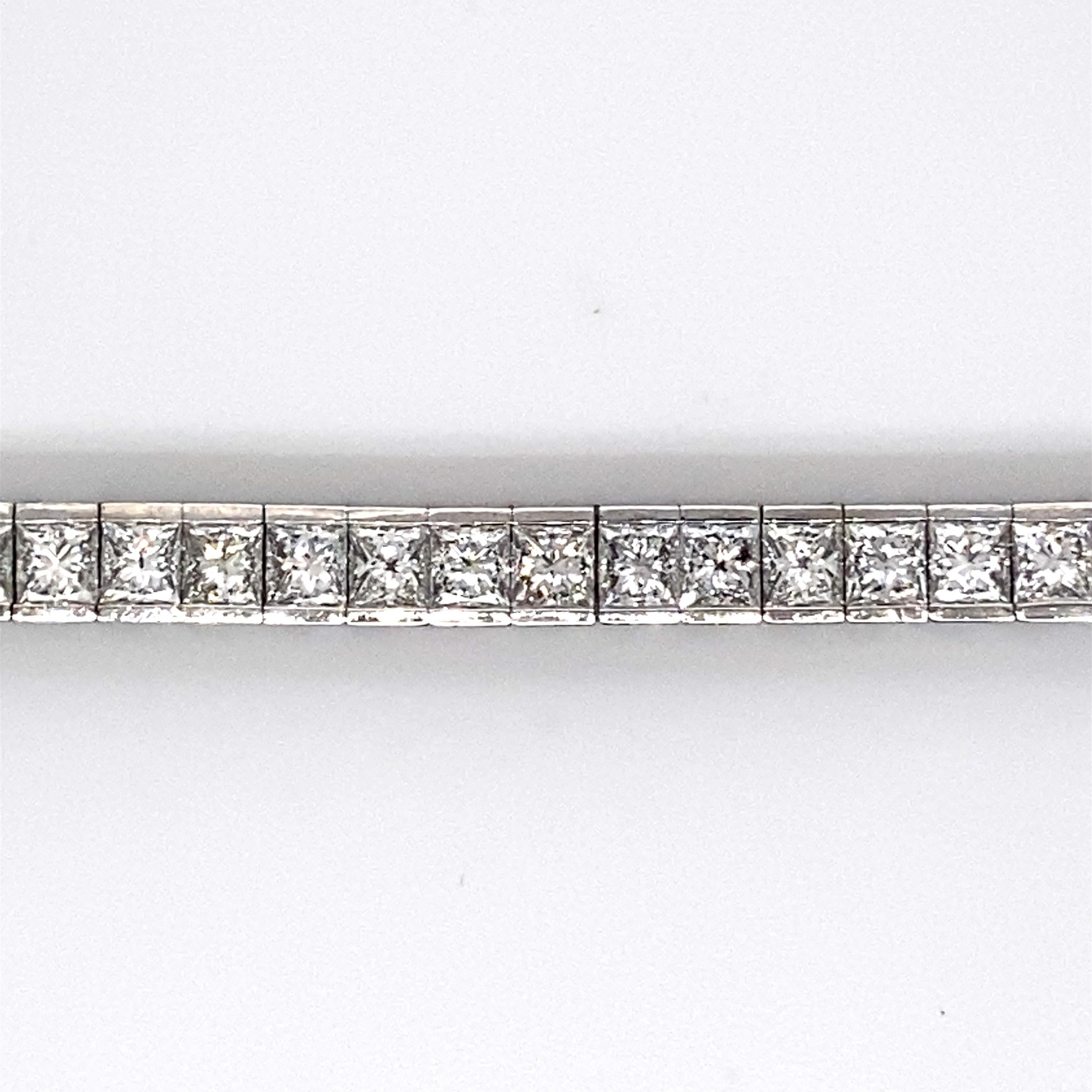 Exquisite and timeless diamonds tennis bracelet. 
55 princess cut diamonds, approximately 9.90 carats total. Approximately G/H color and VS clarity. Channel set platinum. 45.45gr. 
Accommodated with an up to date appraisal by a GIA G.G., please