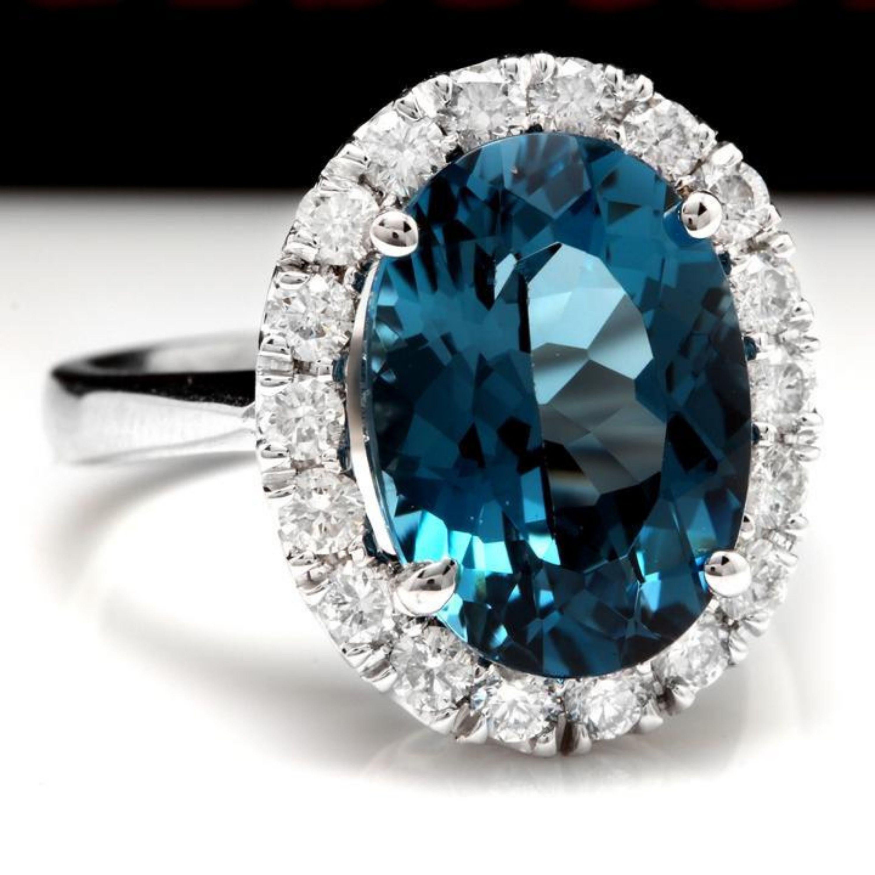 9.90 Carats Natural Impressive London Blue Topaz and Diamond 14K White Gold Ring

Total Natural London Blue Topaz Weight: 9.00 Carats

London Blue Topaz Measures: 14.00 x 10.00mm

London Blue Topaz Treatment: Heat / Irradiation

Natural Round