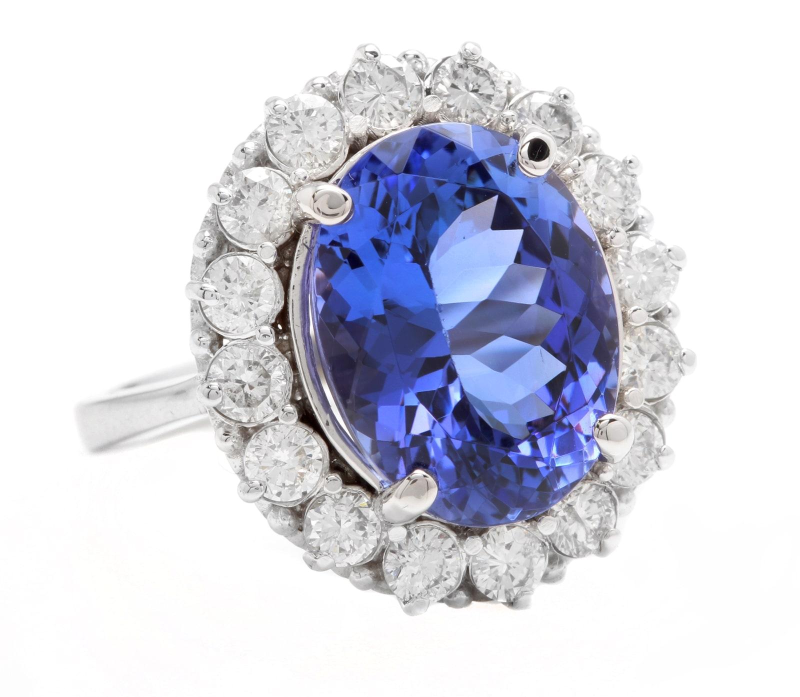 9.90 Carats Natural Very Nice Looking Tanzanite and Diamond 18K Solid White Gold Ring

Suggested Replacement Value: Approx.  $10,000.00

Total Natural Oval Cut Tanzanite Weight is: Approx. 8.50 Carats 

Tanzanite Measures: Approx.  14.00 x 12.00mm
