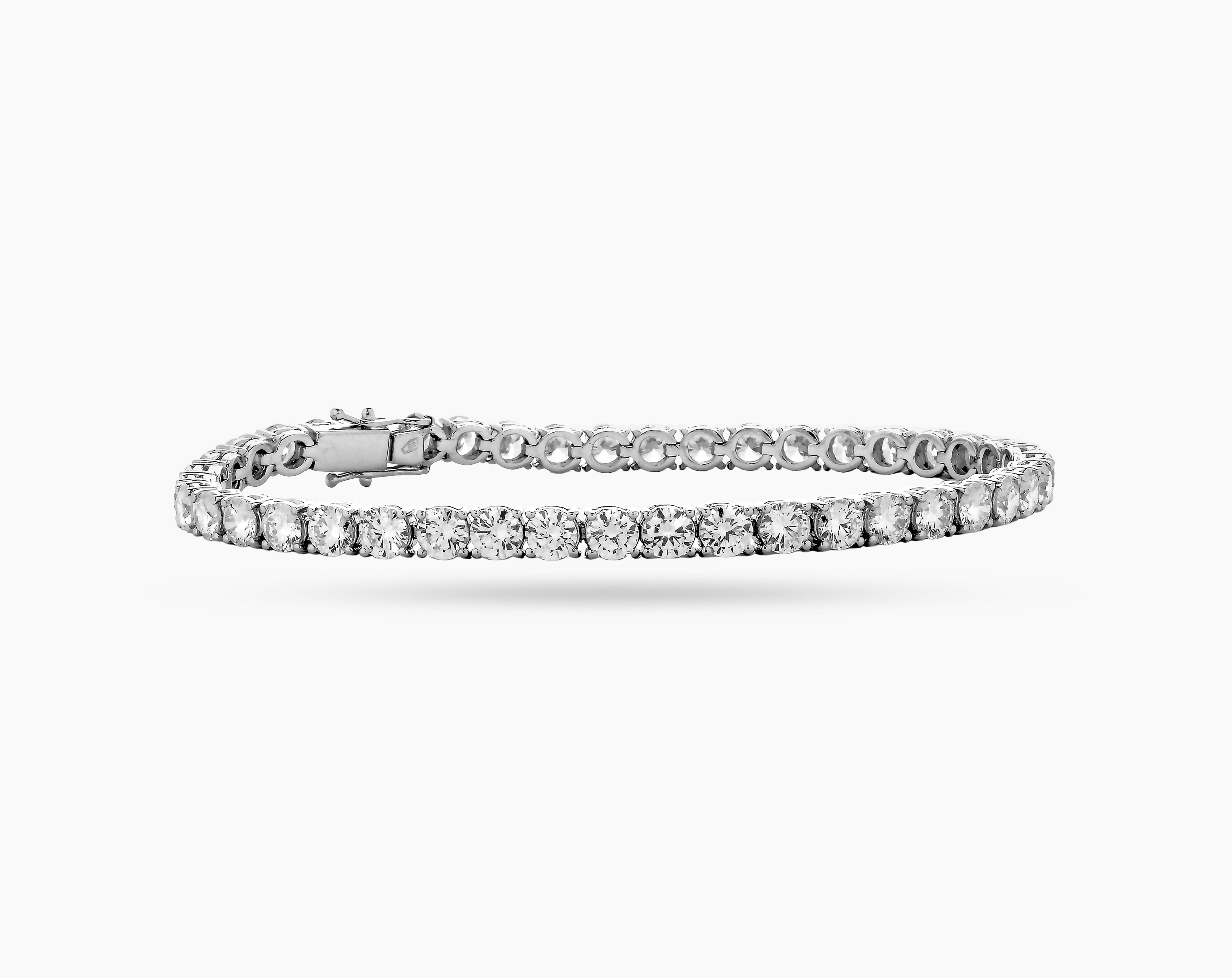 HRD (Antwerp diamond high council) certified 10.07 carats E/F-VVS/VS diamonds tennis bracelet from CARON Fine jewellery.

 An impressive example of the classical tennis bracelet made famous by Chris Evert is this bracelet in 18k white gold with 43
