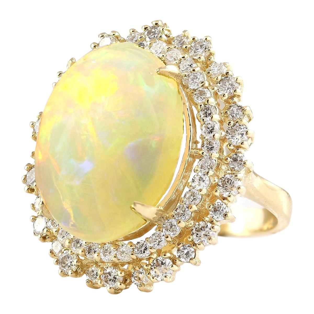 9.91 Carat Opal 14 Karat Yellow Gold Diamond Ring
Stamped: 14K Yellow Gold
Total Ring Weight: 9.2 Grams
Total  Opal Weight is 7.91 Carat (Measures: 18.00x13.00 mm)
Color: Multicolor
Total  Diamond Weight is 2.00 Carat
Color: F-G, Clarity: