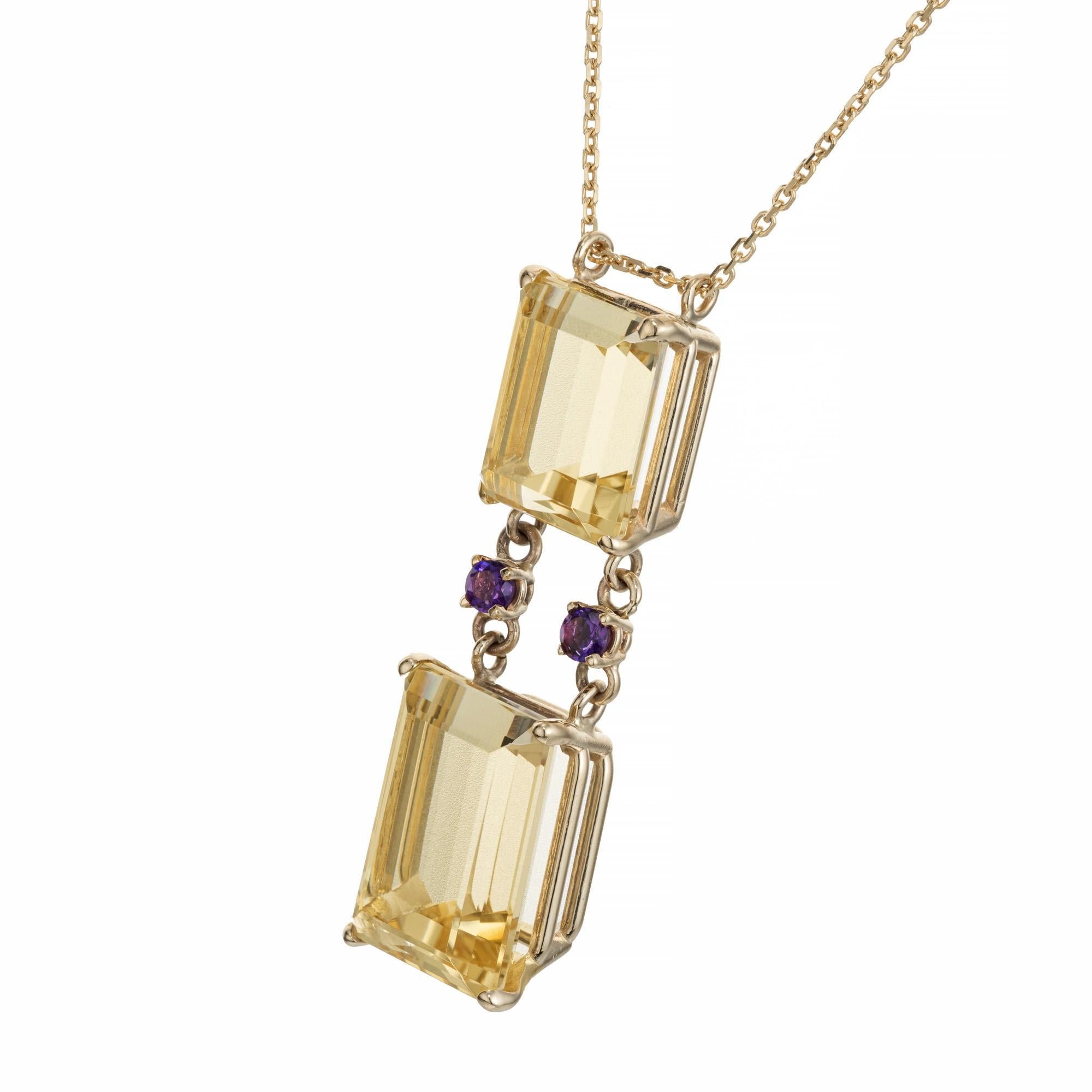 Beryl Heliodor and amethyst Art Deco style pendant necklace. Made from two bright yellow genuine golden Beryl Heliodor emerald cut shape. Hinged and separated by two round 2.7mm bright purple Amethyst.  The stones are set into a simple 14k yellow