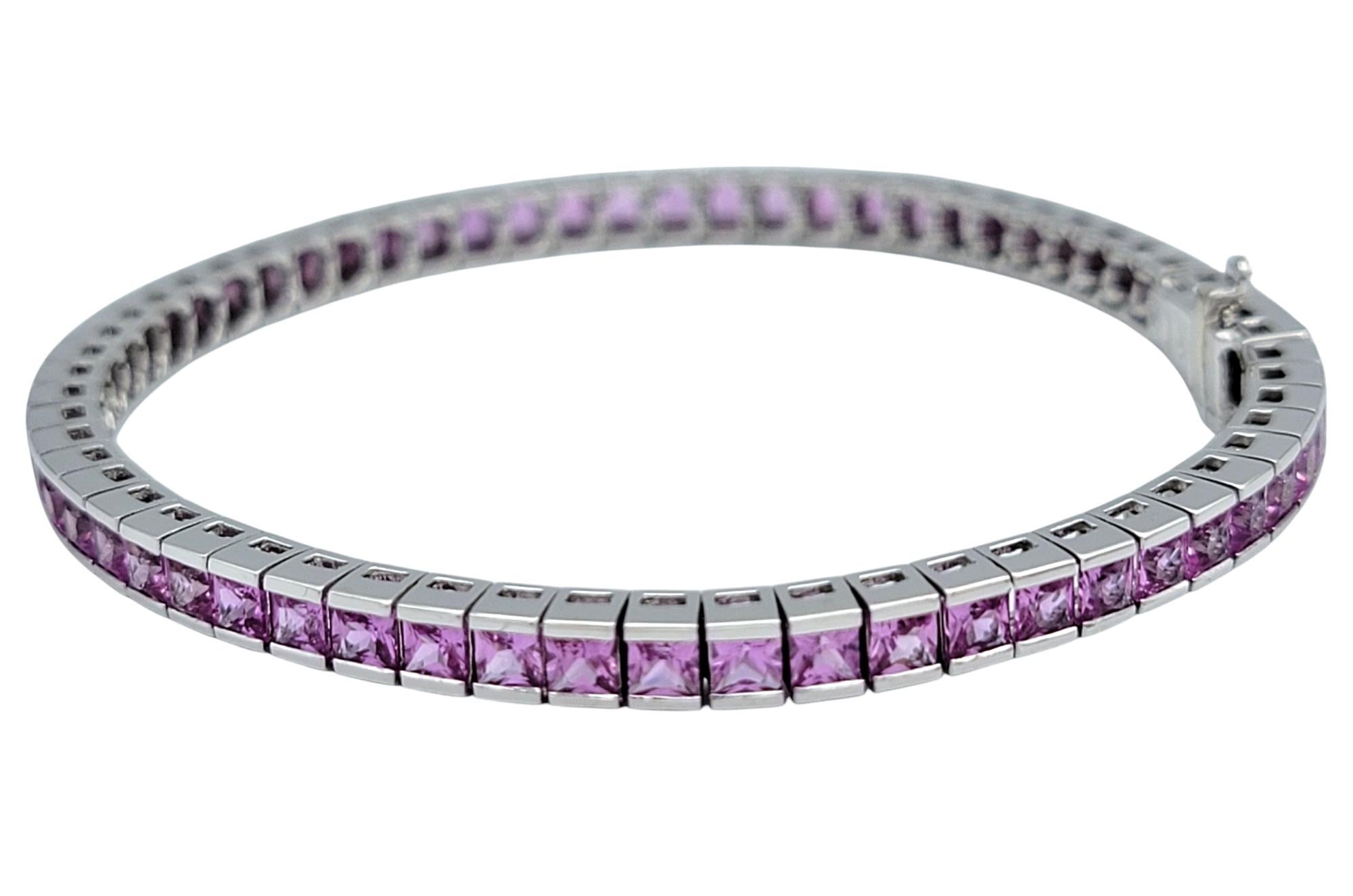 Contemporary 9.92 Carat Total French Cut Pink Sapphire Tennis Bracelet in 14 Karat White Gold For Sale