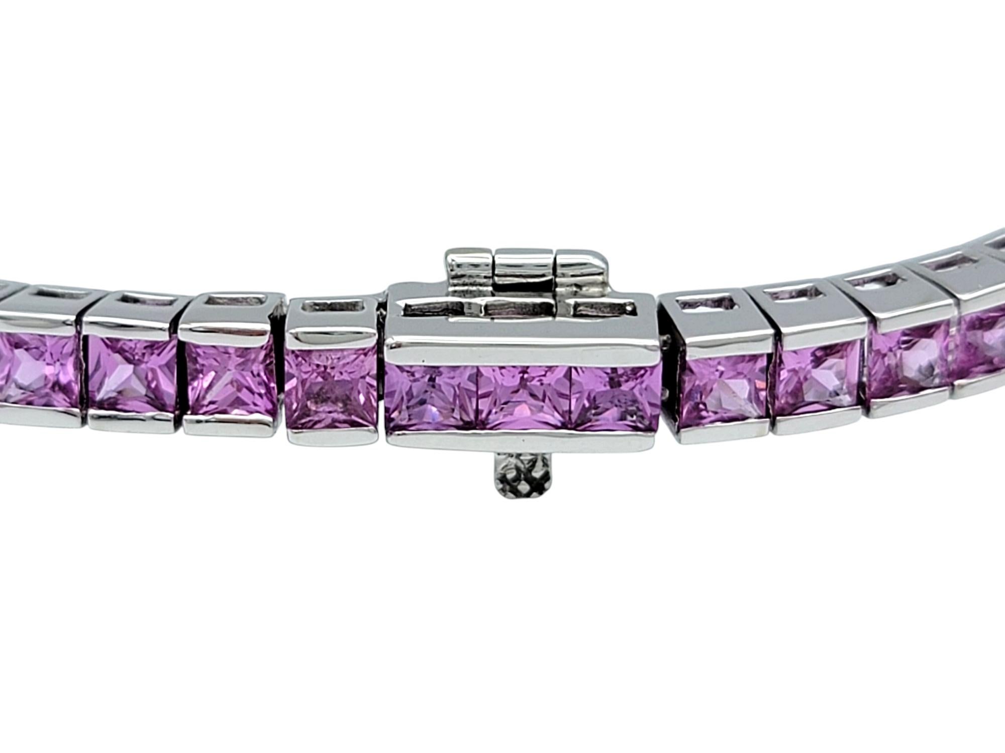 Women's 9.92 Carat Total French Cut Pink Sapphire Tennis Bracelet in 14 Karat White Gold For Sale