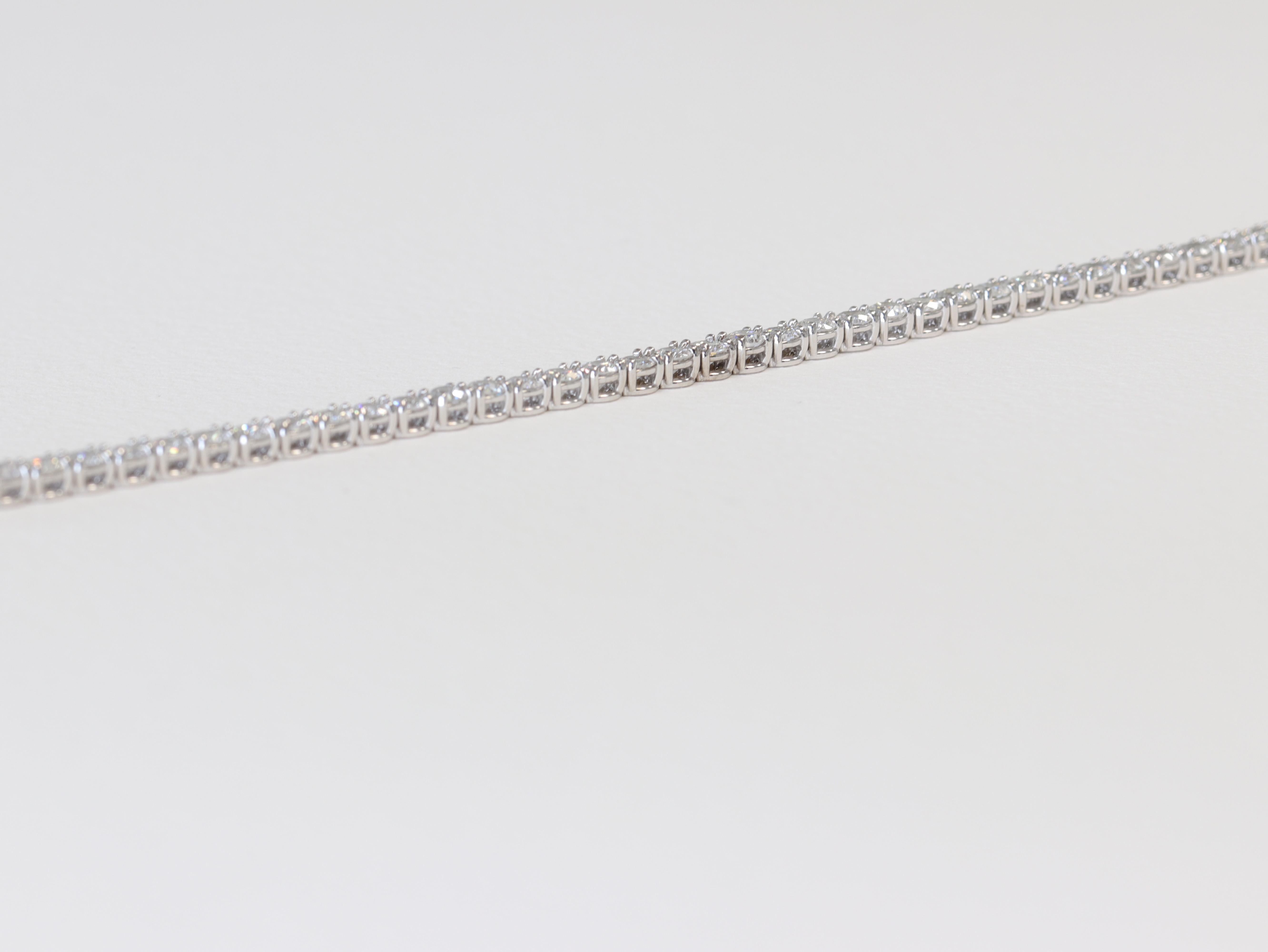 Modern 9.94 Carat Round Brilliant Cut Diamond Tennis Bracelet For Sale