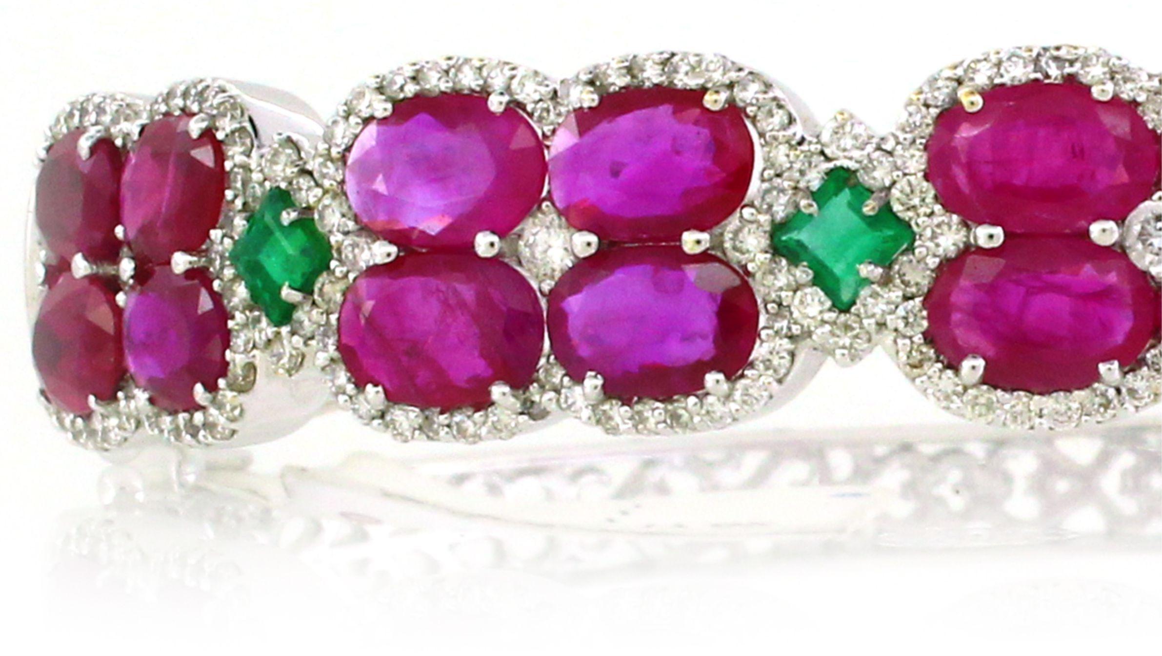 Modern 9.94 cts of Ruby and 0.53 cts of Emerald Cuff Bracelet For Sale