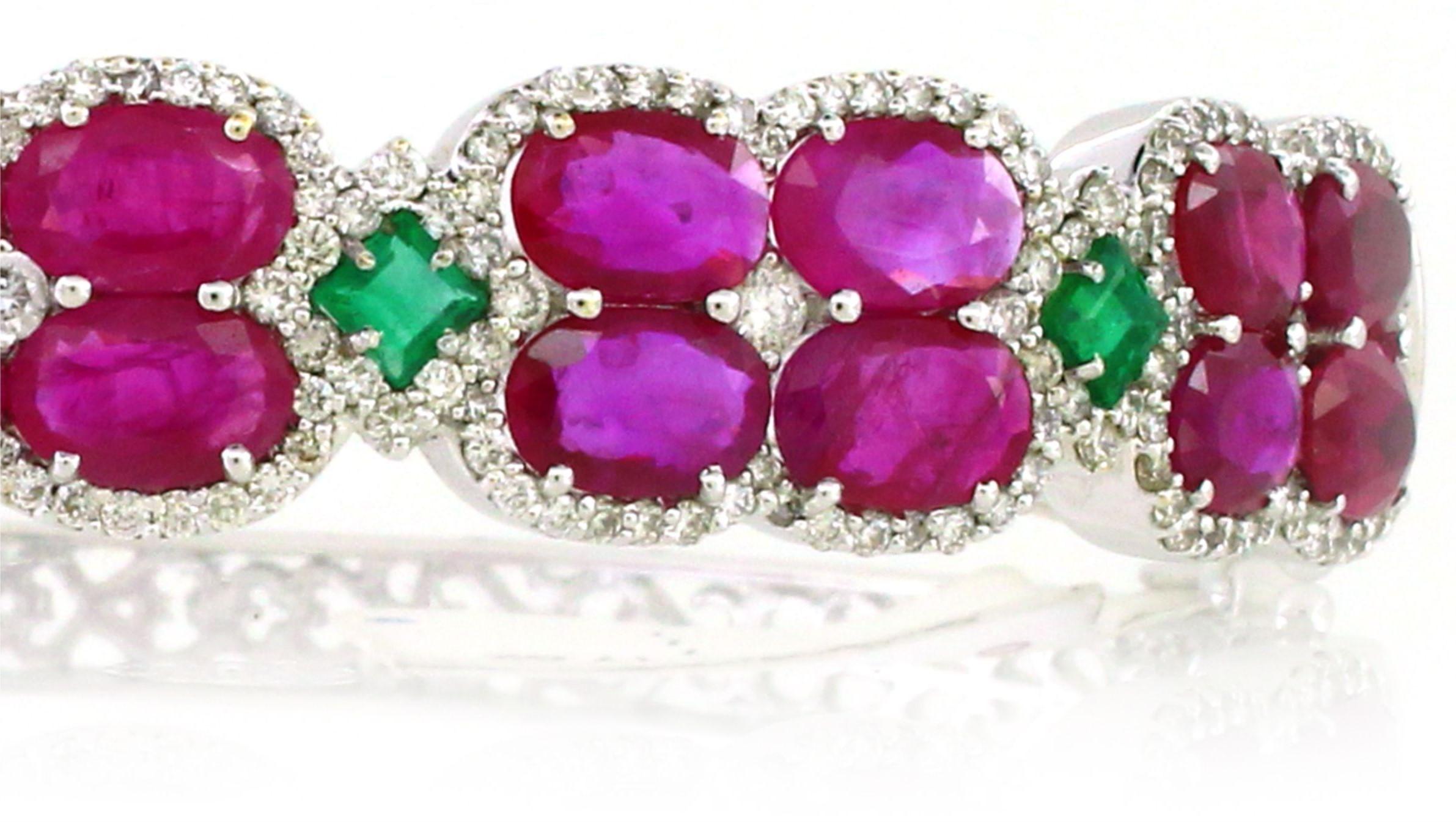 Oval Cut 9.94 cts of Ruby and 0.53 cts of Emerald Cuff Bracelet For Sale