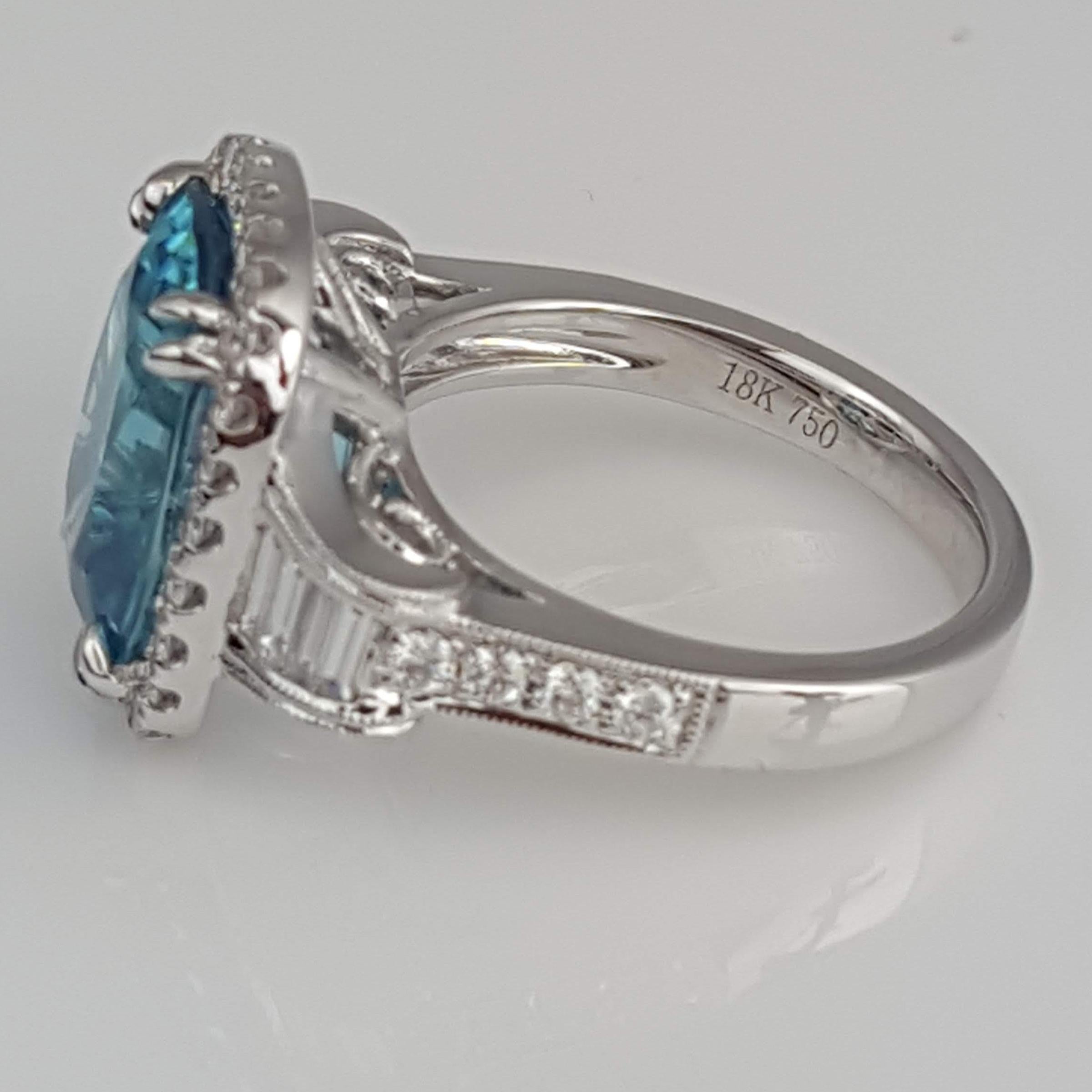 DiamondTown 9.95 Carat Oval Cut Blue Zircon and 0.74 Carat Diamond Ring In New Condition In New York, NY