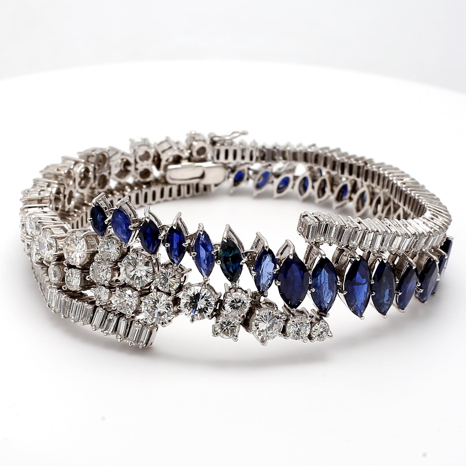 Title:
9.95 Carat Marquis Shape Sapphire 9.00 Carat Baguette Shape and Round Brilliant Diamond Platinum 1960'S Bracelet
Style:
1960'S
Metal:
Platinum
Gemstone 1:
9.95 Carat Saph
Number of Stones:
28
Shape:
Marquis Shape
Gemstone 2:
4.6 Carat
