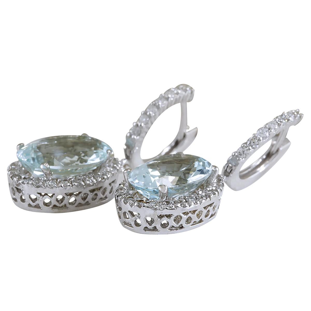 Stamped: 14K White Gold
Total Earrings Weight: 8.6 Grams
Earrings Length: 1.26 Inches
Total Natural Aquamarine Weight is 8.46 Carat (Measures: 14.00x10.00 mm)
Color: Blue
Diamond Weight: Total Natural Diamond Weight is 1.50 Carat
Color: F-G,