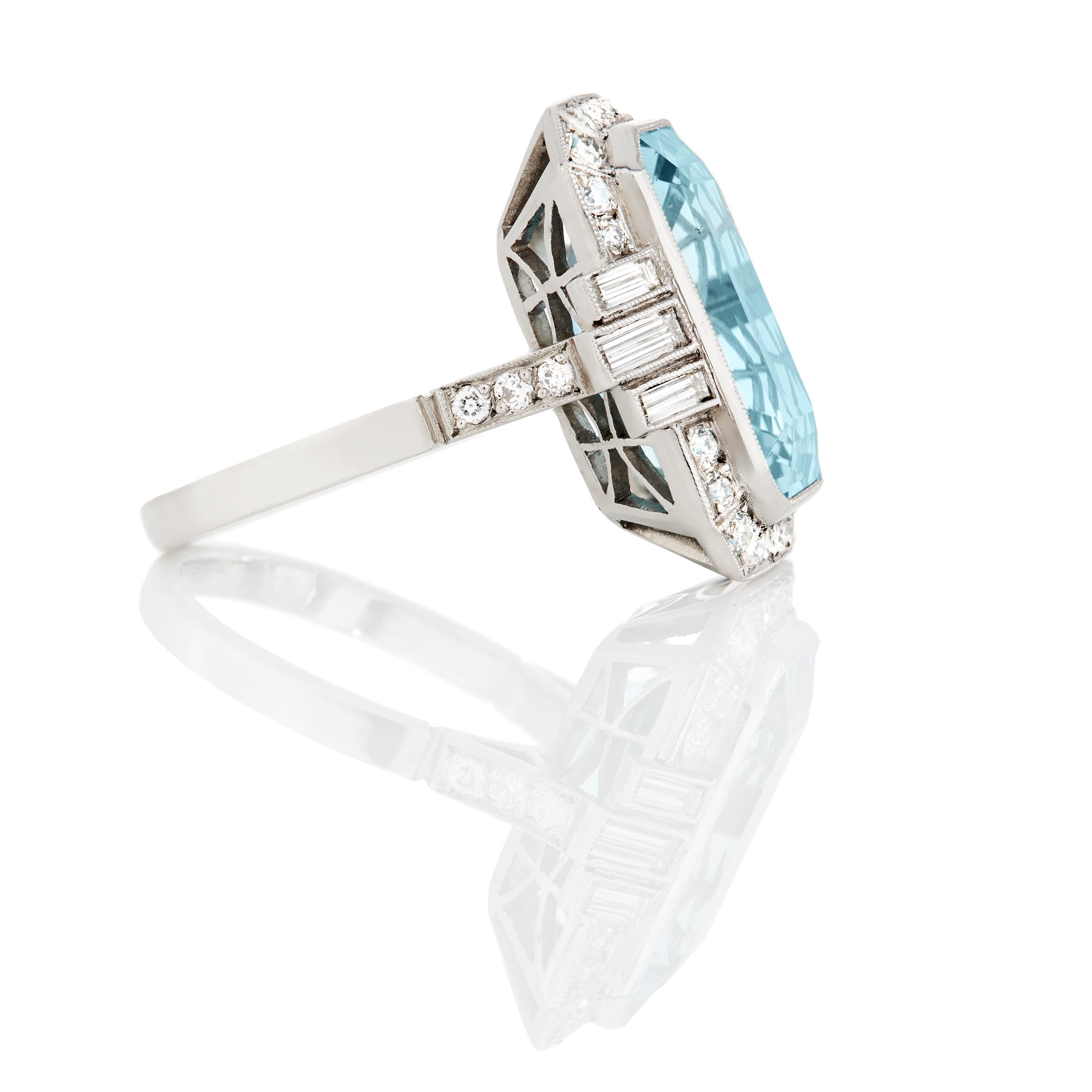 Overall Description:

9.96 Carats Aquamarine
     •Emerald Cut

1.0 Carats Diamond
     •6 Baguette
     •28 Round Brilliant 

Ring Size: 7
*Can be resizable* 

Length: 26.2 mm
Width: 20.65 mm
Weight: 10 grams
