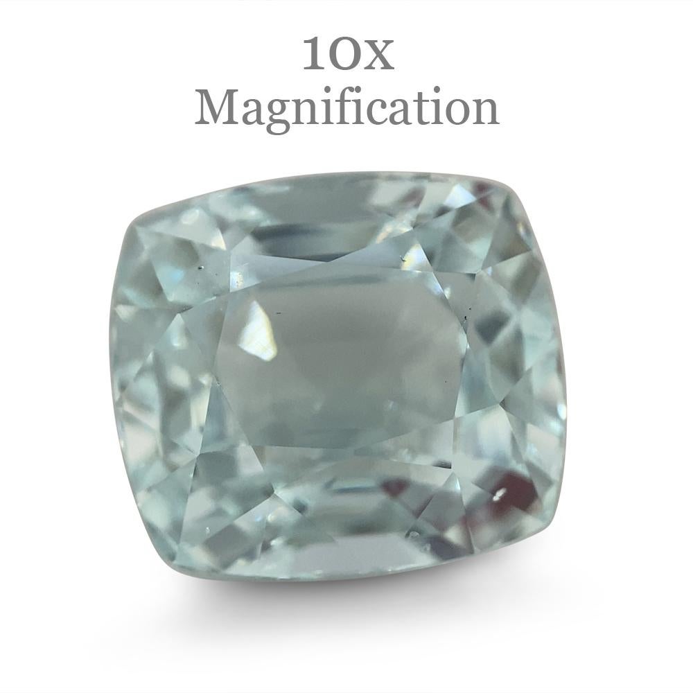 Description:

Gem Type: Aquamarine
Number of Stones: 1
Weight: 9.96 cts
Measurements: 12.83 x 11.62 x 9.98 mm
Shape: Cushion
Cutting Style Crown: Brilliant Cut
Cutting Style Pavilion: Step Cut
Transparency: Transparent
Clarity: Very Slightly