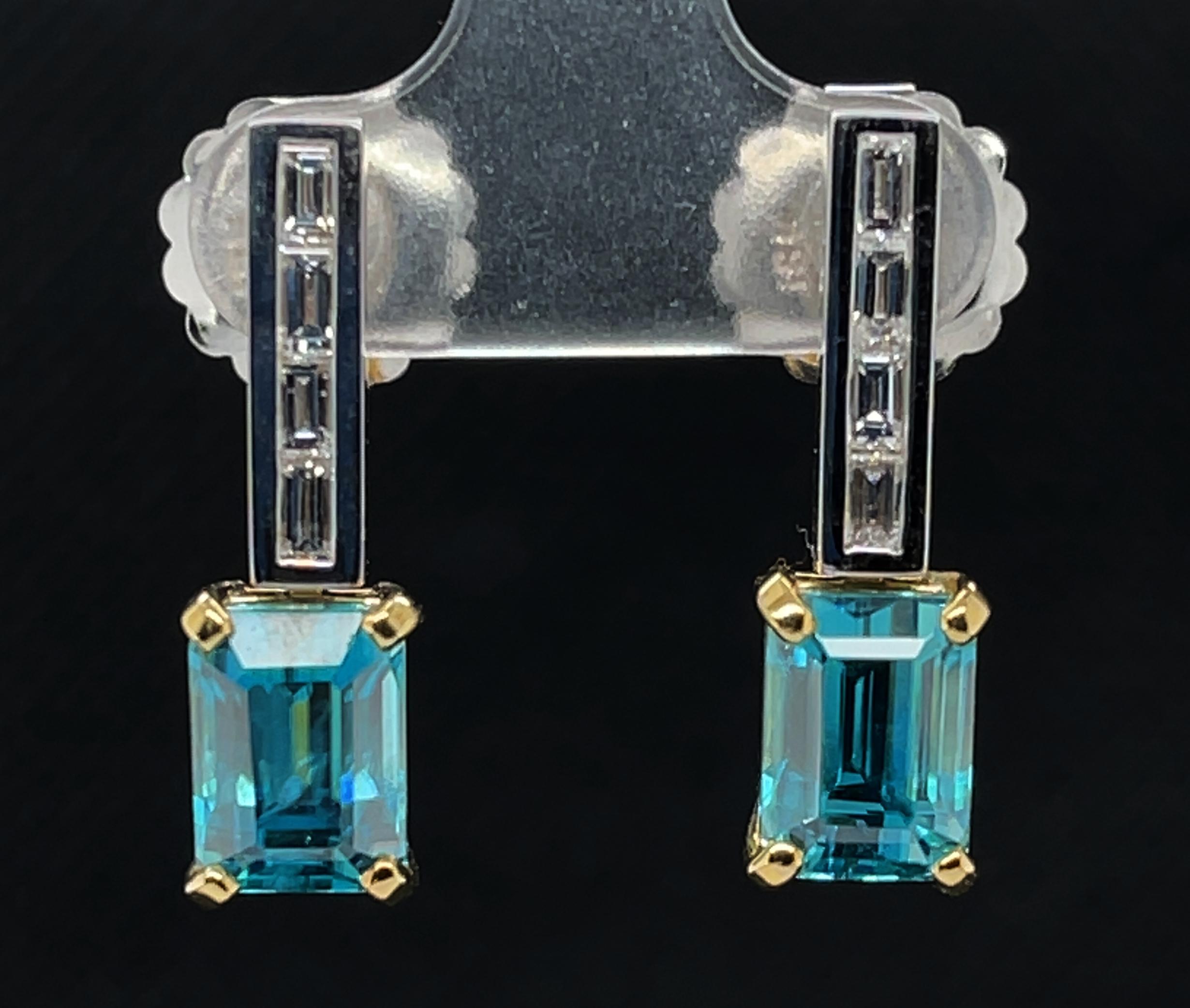 Vibrant peacock blue zircons are featured in these beautiful, Art Deco inspired earrings. The zircons are exceptionally fine quality and perfectly matched; set with baguette cut diamonds these earrings are spectacular! Part of our exclusive 