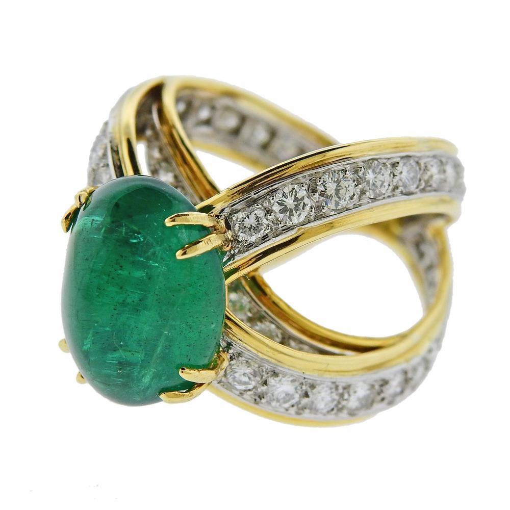18k yellow gold ring, set with approx. 9.97ct emerald cabochon (measures 14.45 x 11.7mm) and approx. 2.00ctw in diamonds. Tested 18k. Ring size - 7, ring top is 20mm wide.