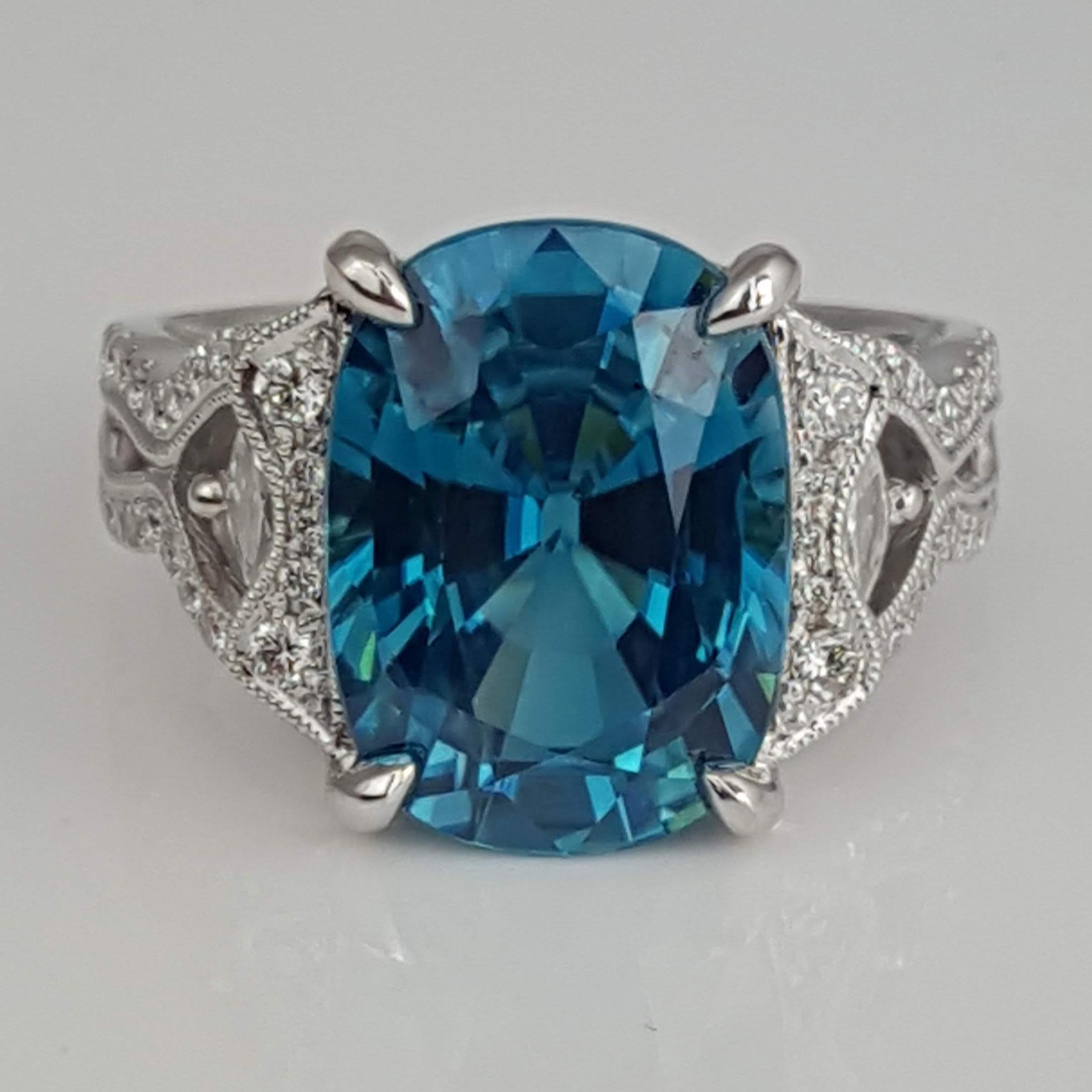 Contemporary 9.98 Ct Oval Cut Blue Zircon and 0.54 Carat Natural Diamond Ring in 18W ref1361 For Sale