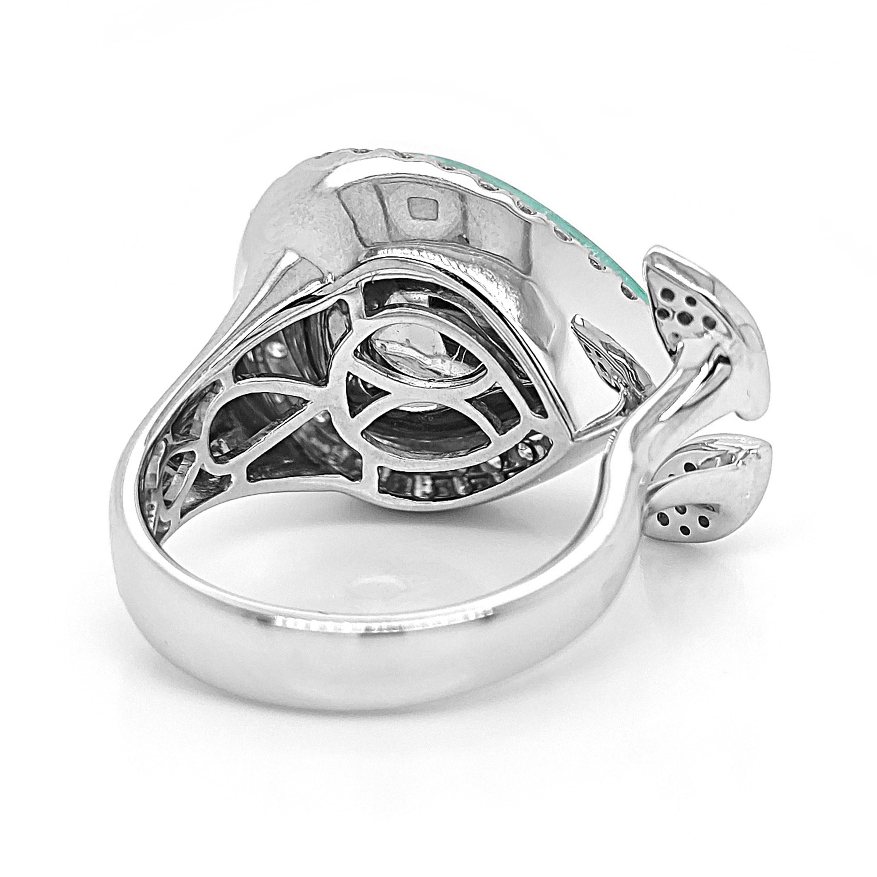1 gemma PARAIBA TOURMALINE: 9,42 carati
26 diamanti tondi bianchi: 0,13 Carati
29 diamanti tondi bianchi: 0,43 Carati
Metallo: Oro bianco 18 carati, 9.00  Grammi
