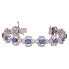 Bracelet tennis en or blanc 18 carats avec saphirs clairs et diamants de 9,99 carats