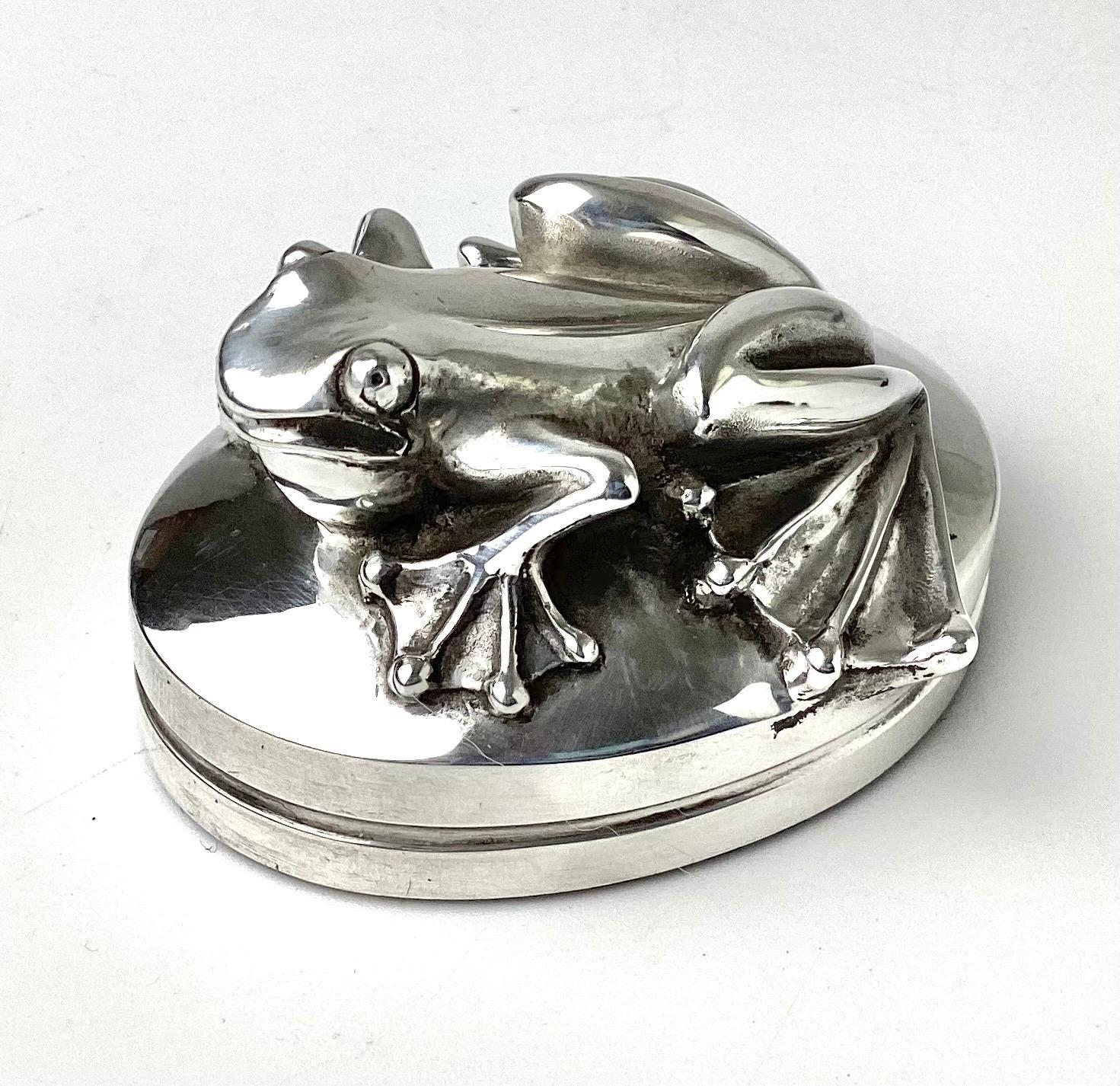 1 of 11
999 Pure Silver Repousse Frog / Toad Sculpture or Paperweight by Henryk Winograd

Sold: $408.27

Days on 1stDibs: 699
999 pure silver repousse frog or toad sculpture or paperweight by Henryk Winograd, circa 1970s. The piece is 2.75