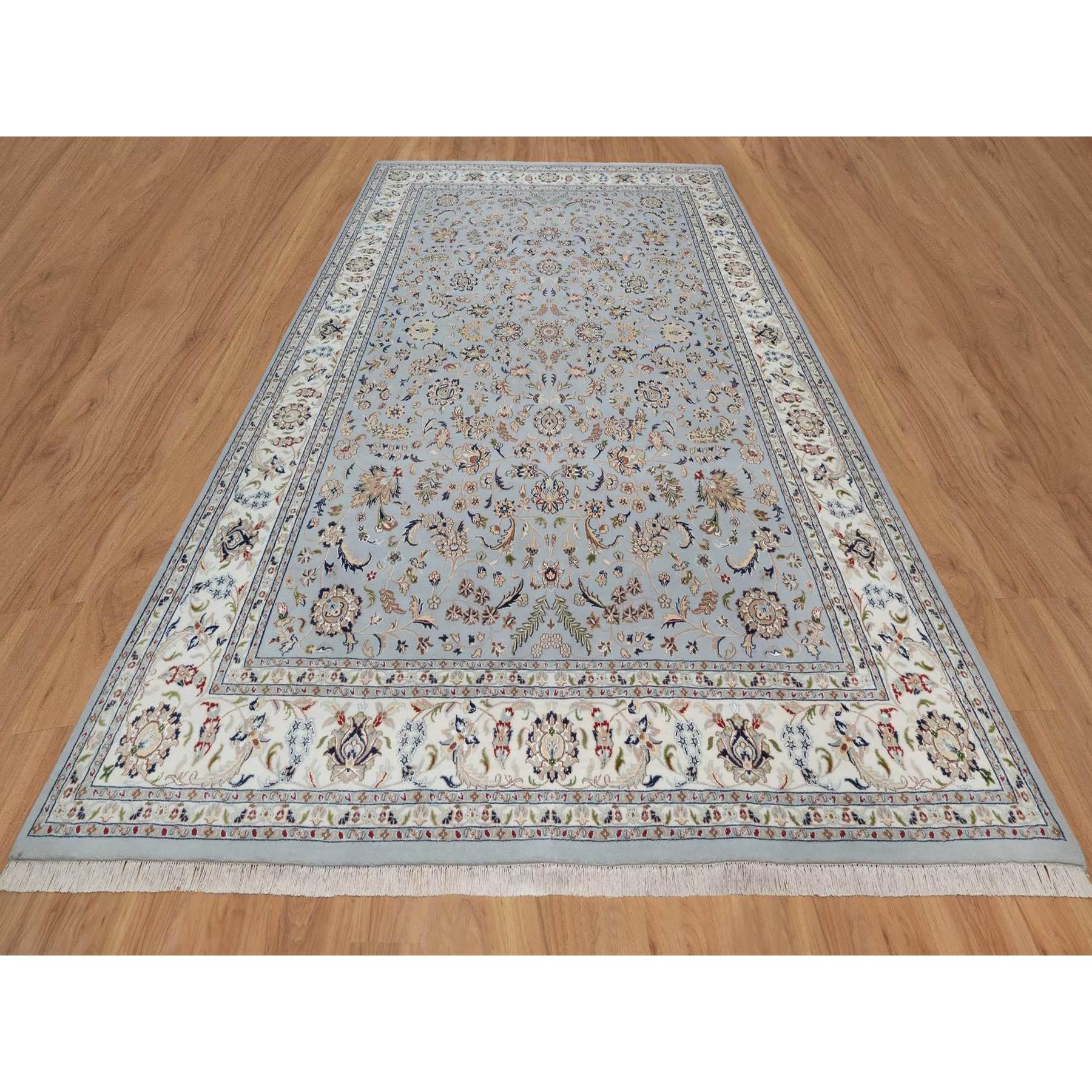 Light Blue, Hand Knotted, Wool and Silk, Soft Pile, 250 KPSI, Nain with All Over Design, Oriental Rug
Primary materials: Wool & Silk
Latex: No Pile 
height: 0.25 Inches
Style: Traditional
Primary color: Blue
Secondary colors: Brown, Navy Blue, Red,