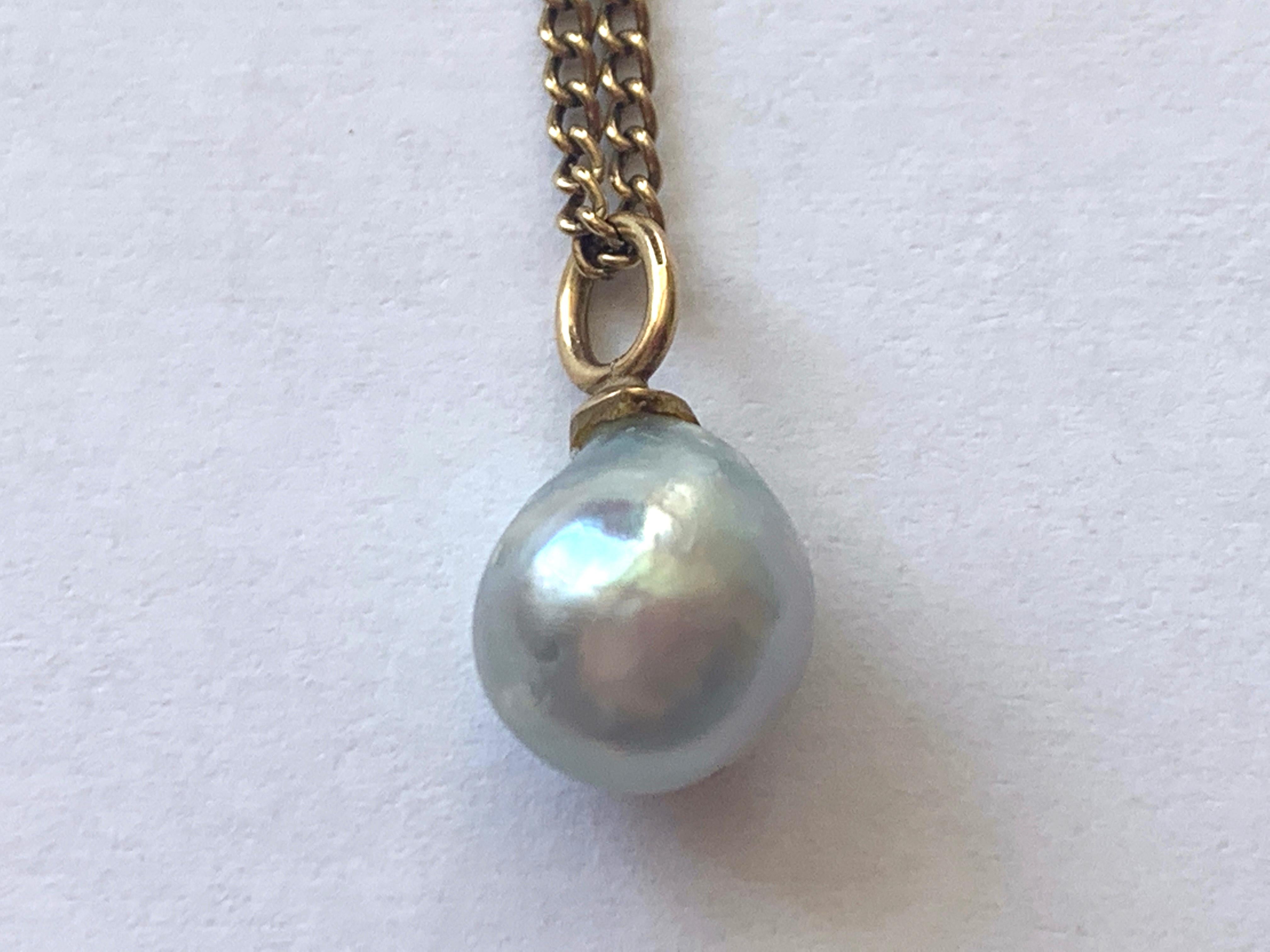 Antique Light Blue Baroque Cultured Pearl 
on a 9ct Gold Bail - 
Hung on a 9ct Antique Gold 19