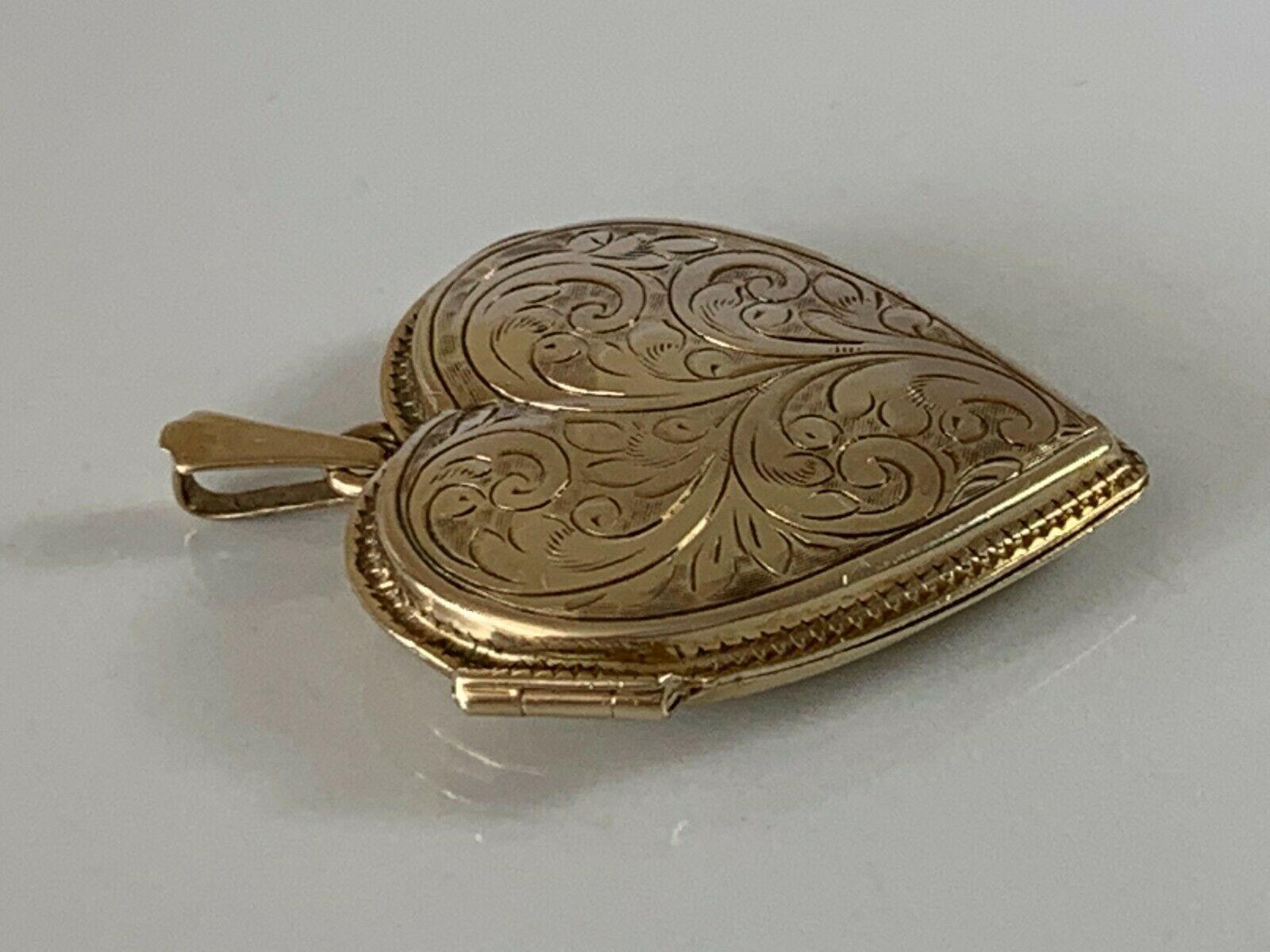 9ct 375 Gold Very Large Heart Locket
with beautiful front floral engraving
Fully Hallmarked Bail 
Era Late 20th Century
