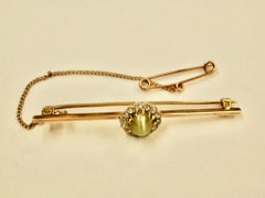9ct Bar Brooch with Chrysoberyl Cats Eye & Diamond Surround in Centre, Circa 1900