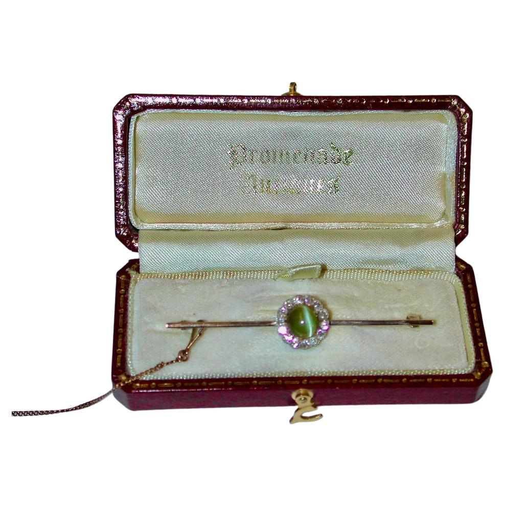 9ct Bar Brooch with Chrysoberyl Cats Eye & Diamond Surround in Centre, Circa 1900 For Sale