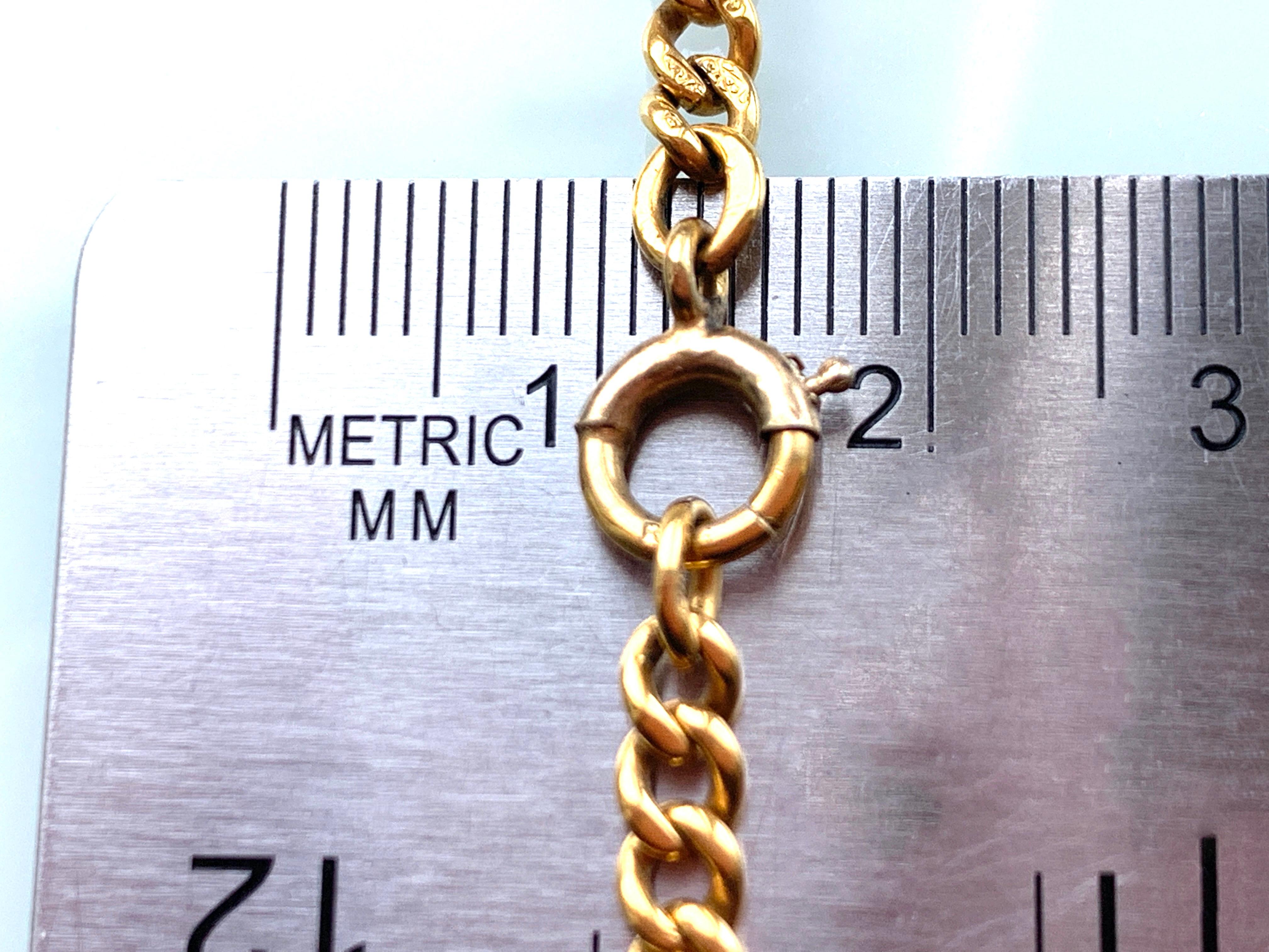  18ct Gold Pendant on a 9ct Gold Antique Chain  1
