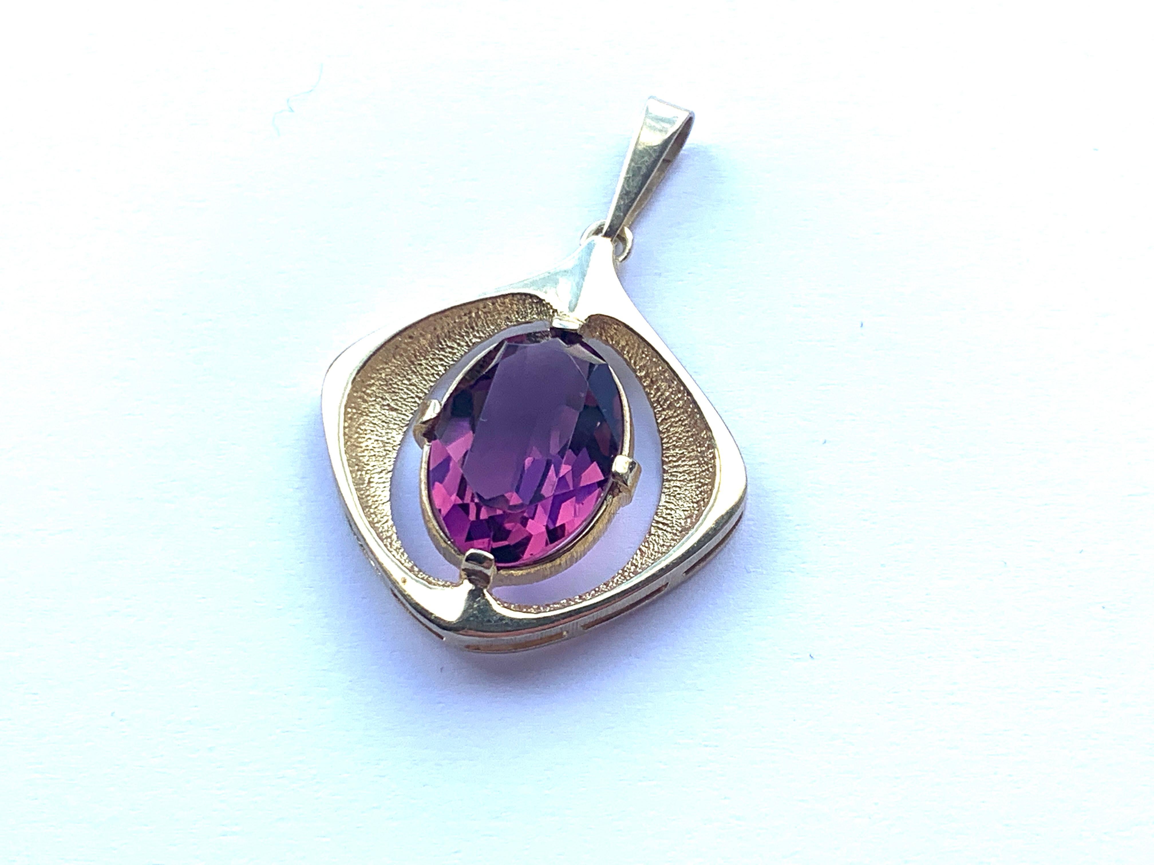 Contemporary modernist 
9ct Gold Amethyst Pendant
Stone : 8.75ct Oval Amethyst Gem 
By Danish Designer Hermann Siersbol
Exquisite Contemporary Design
Fully Hallmarked (British - import) with Letters H.S
Weight 5.5 grammes
In excellent