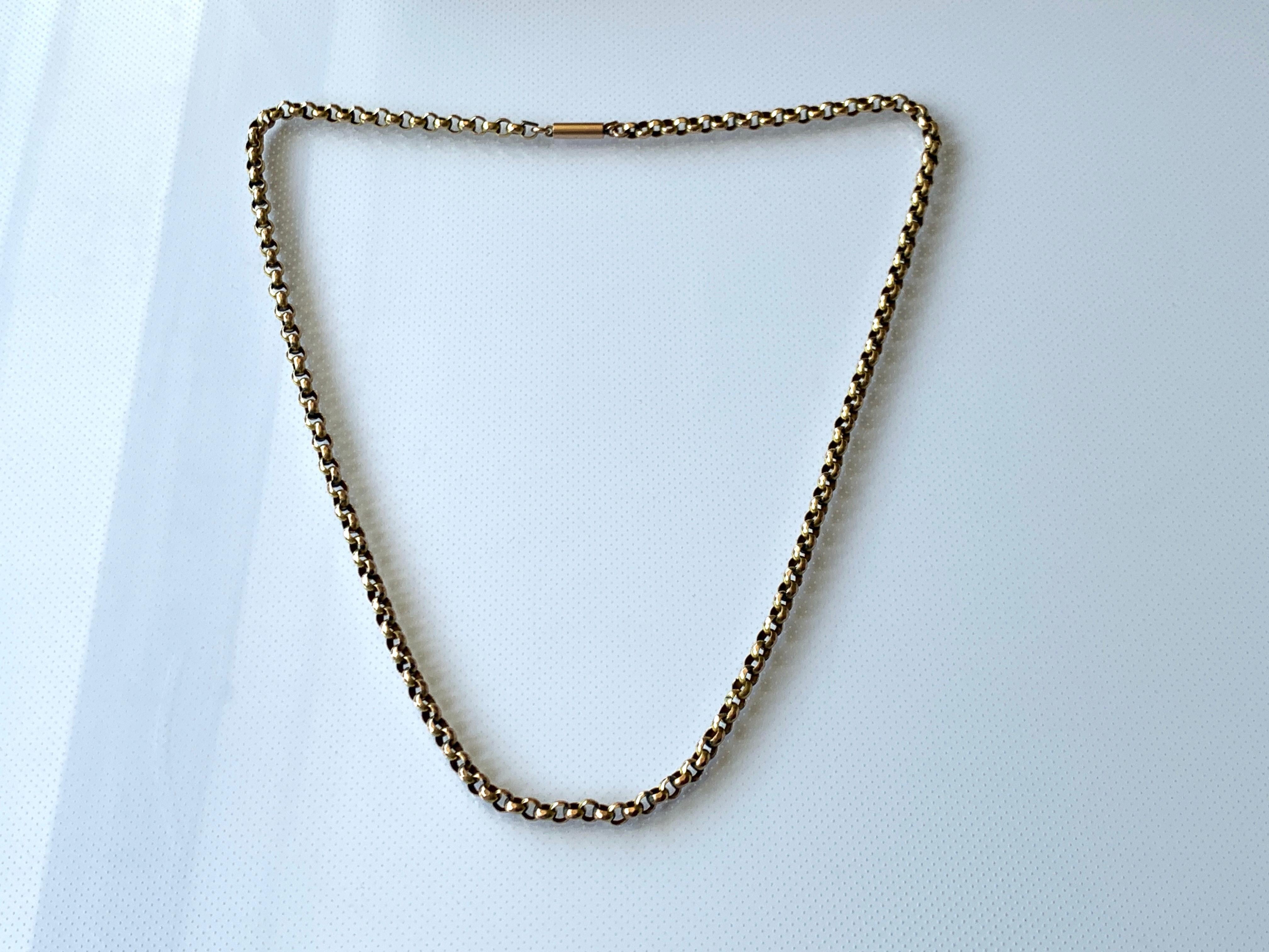 9ct Gold Victorian Chain 
with barrel clasp 
and a 9c plaque attached 
Barrel clasp is secure & tight .
In lovely condition with Rose gold highlights upon the decorative links 
Chain has been handcrafted in  1880s 
18