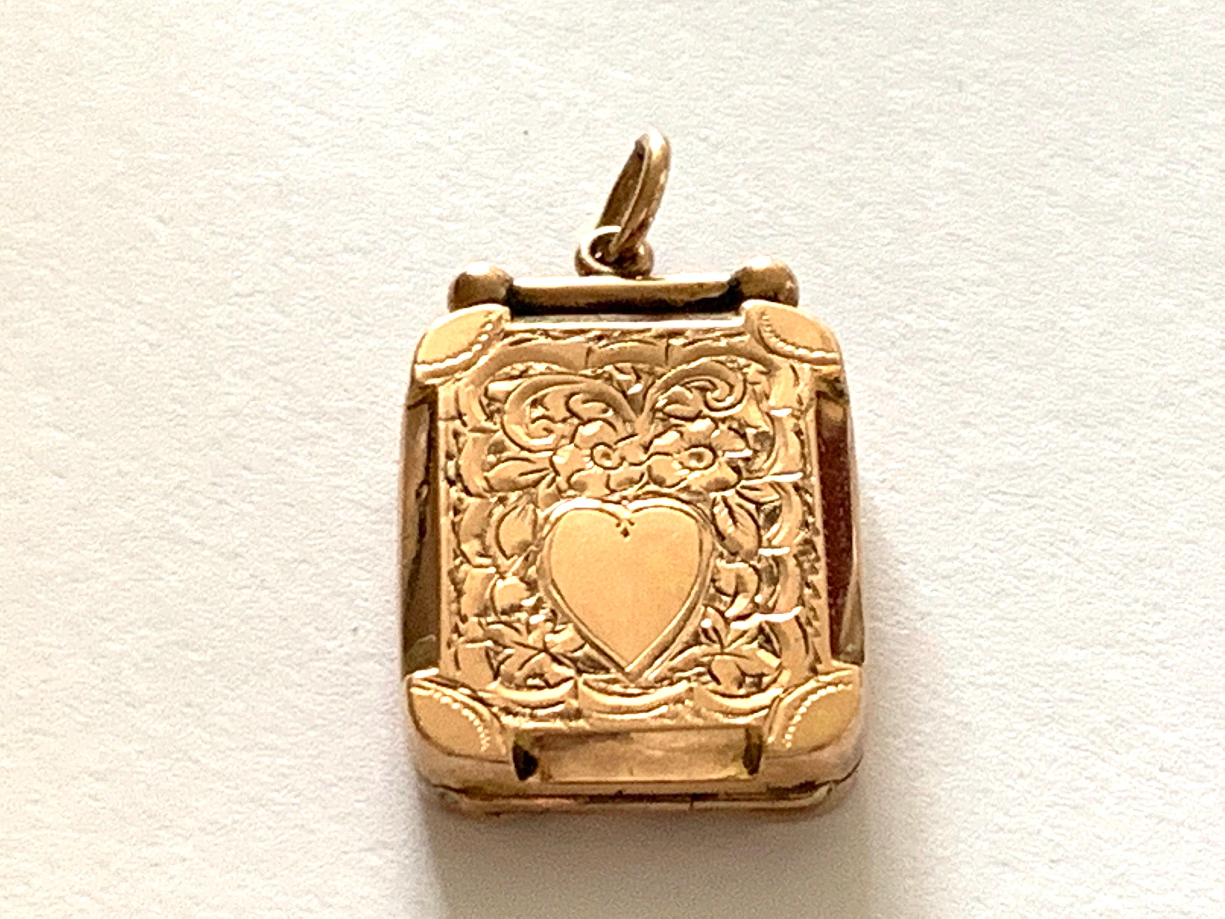 9ct 375 Gold Antique Locket

With heavily engraved decoration of foliage 
and a central blank love heart for an inscription

Fully Hallmarked on reverse 
9 375 with Birmingham assay office anchor stamp 
and dated letter 