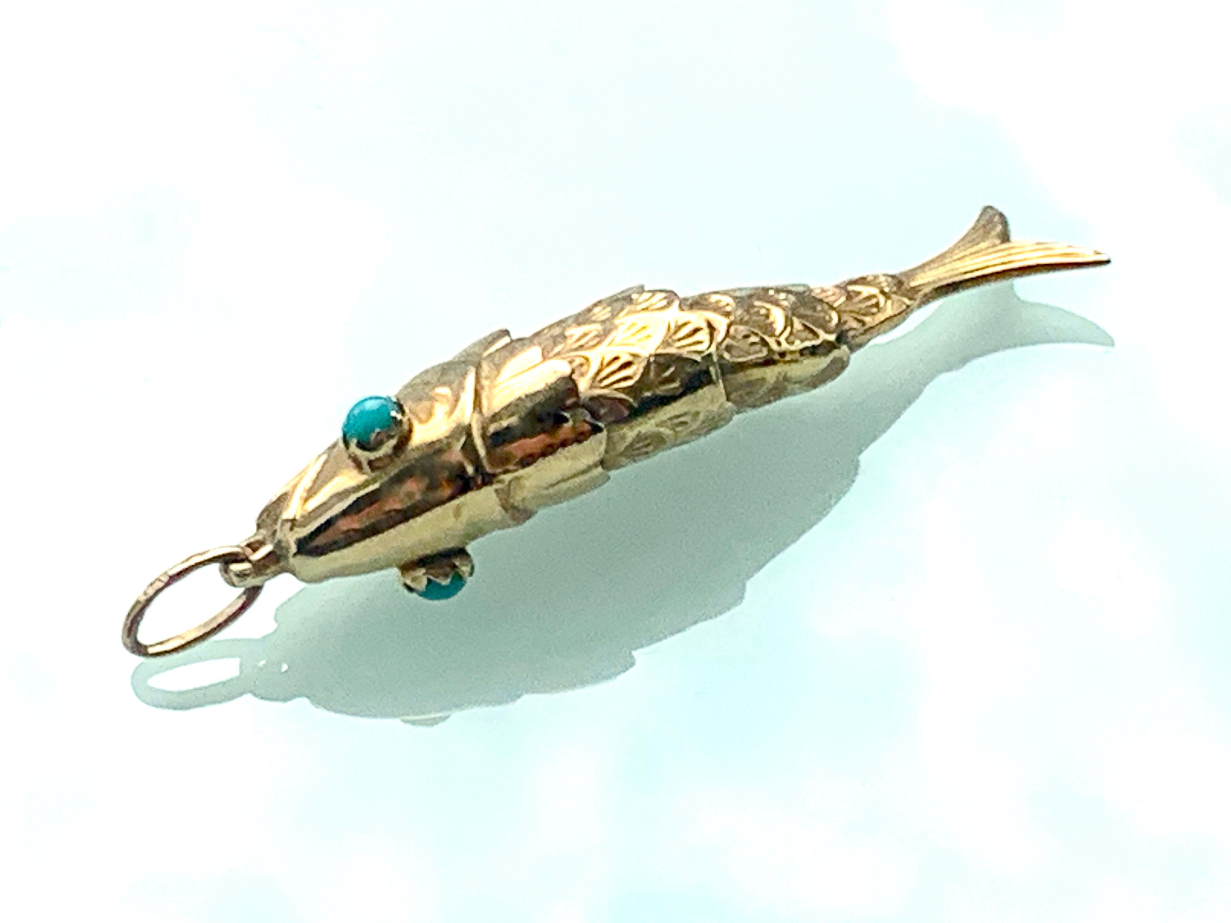 14k gold articulated fish pendant