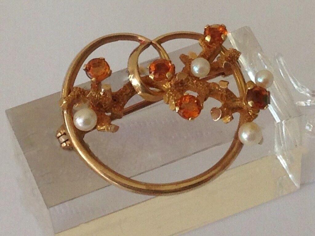 Beautiful 9ct Gold Bark branches design with Tangerine Citrine
with genuine pearl.
Stunning brooch 
the photographs do not do it justice -
much better in real life.
really reflective of the 1960s Glamorous era.\
All components are 9ct gold including