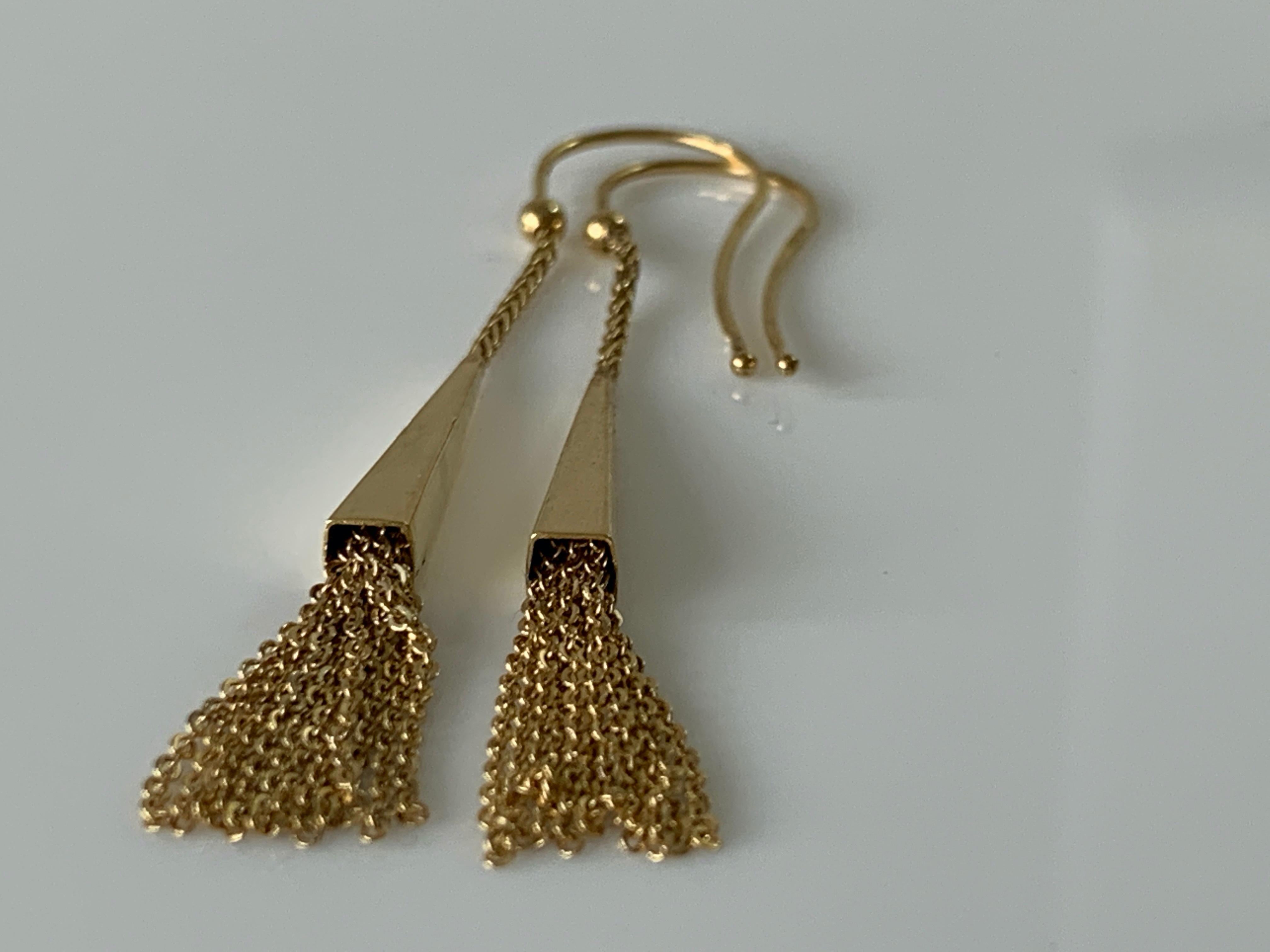 9ct Gold Cone shape earrings with chains sashes
Full U.K Hallmark - import marks 375
& unknown designer stamps present  
on both hooks
Beautifully crafted 
Designer Unknown
