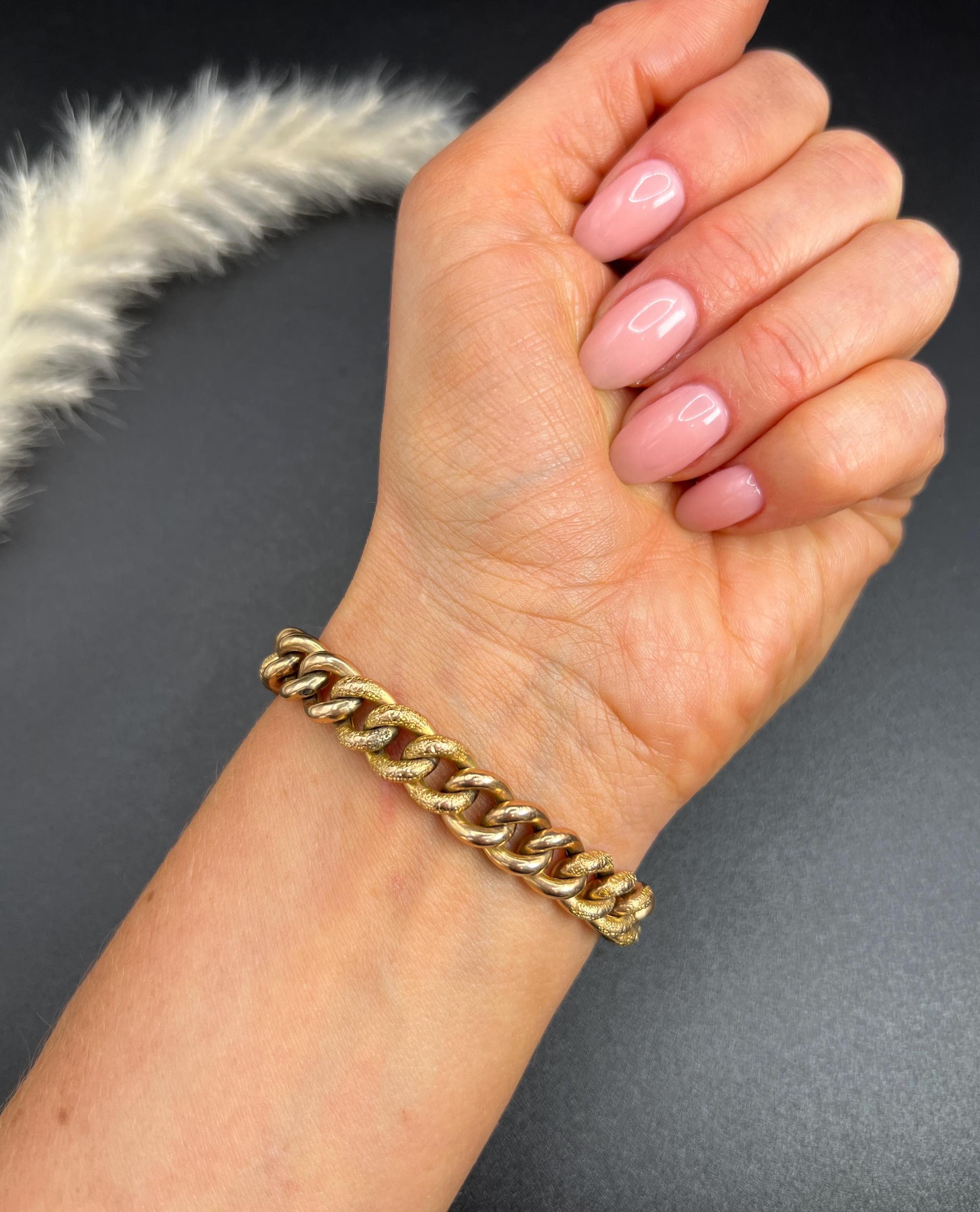Antique Curb Bracelet 

9ct Rose Gold

Makers Mark W & H.S

Circa 1910

This stunning Edwardian curb bracelet radiates beauty and elegance. Crafted from 9ct rose gold, it features a unique 