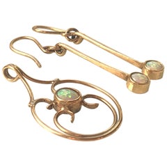 Colgante de ópalo de oro de 9 ct y pendientes a juego