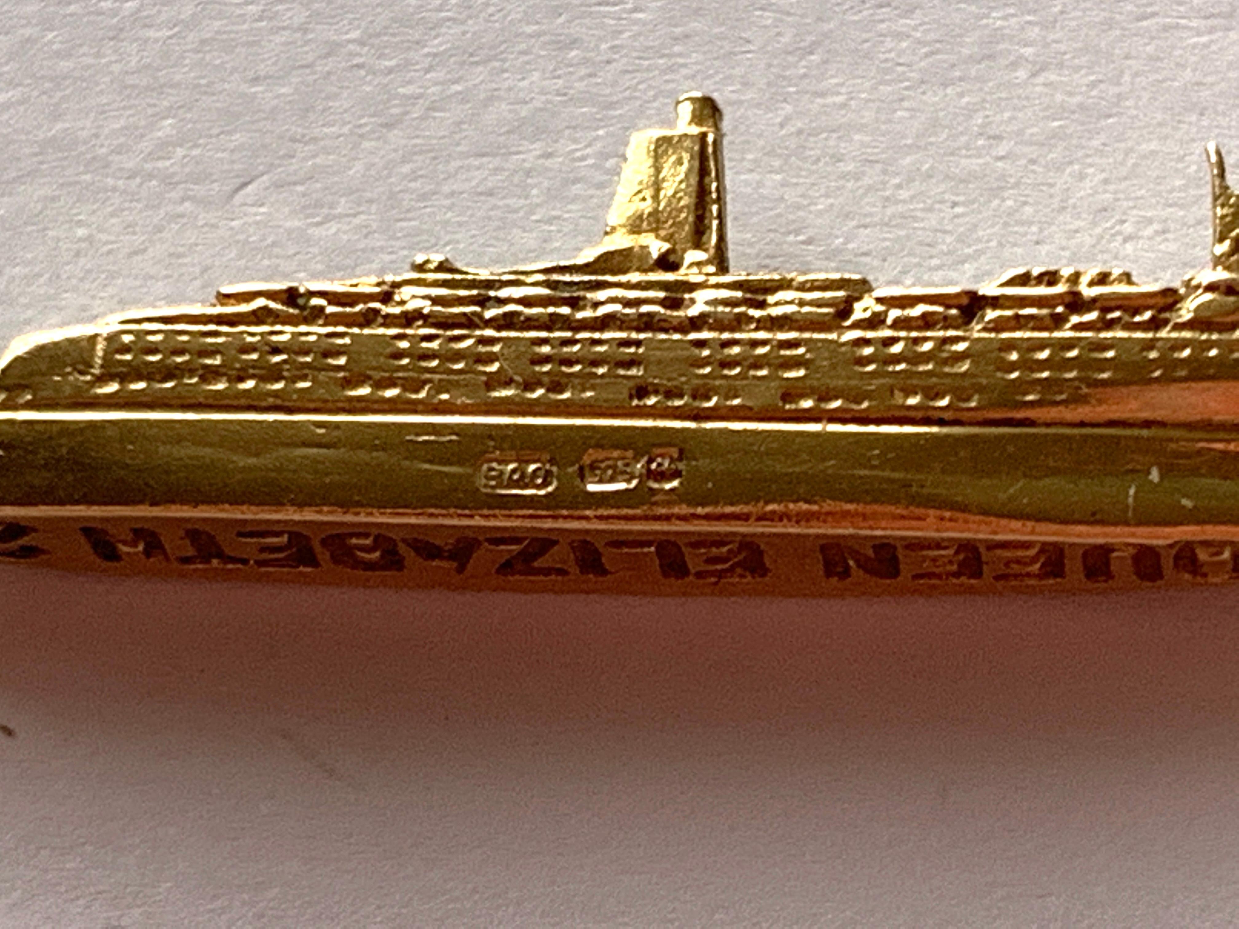 gold ship pendant