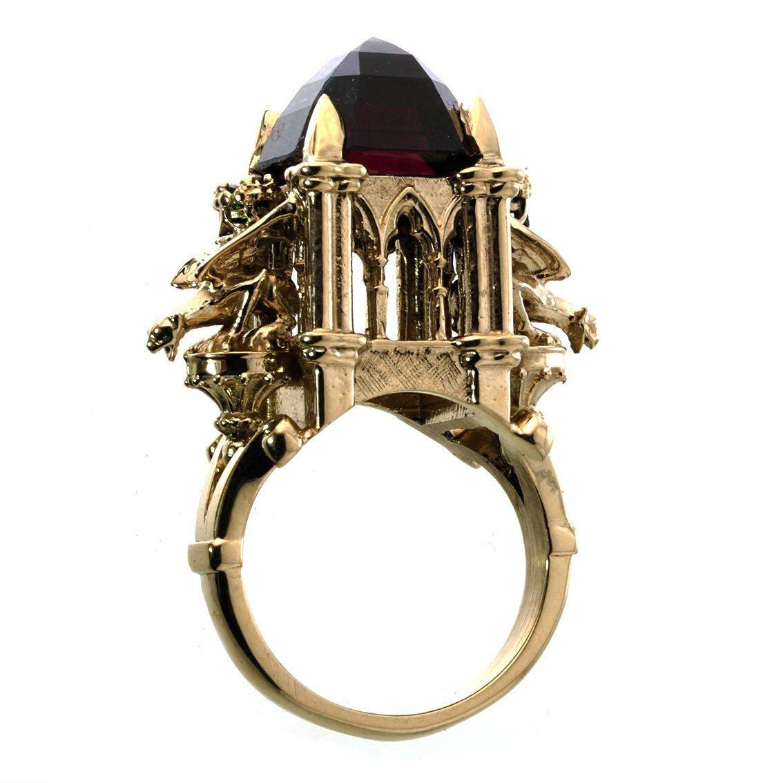 The Beguiled Mortal Ring is an exquisite treasure. This beguiling adornment is one of a kind and fits a size L 1/2.

Handcrafted in 9ct yellow gold, the ring features a 12mm x 12mm, rhodolite garnet. This stunning garnet radiates vibrant flashes of