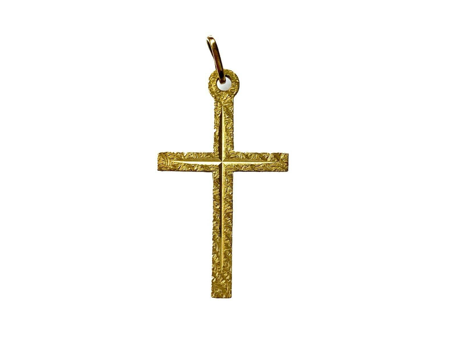 9ct Gold Cross 
With beautiful textural surface engraved design applied 
Era 1970s
Weight 0.73 gramme
Stamped 375 on Closed Bail.