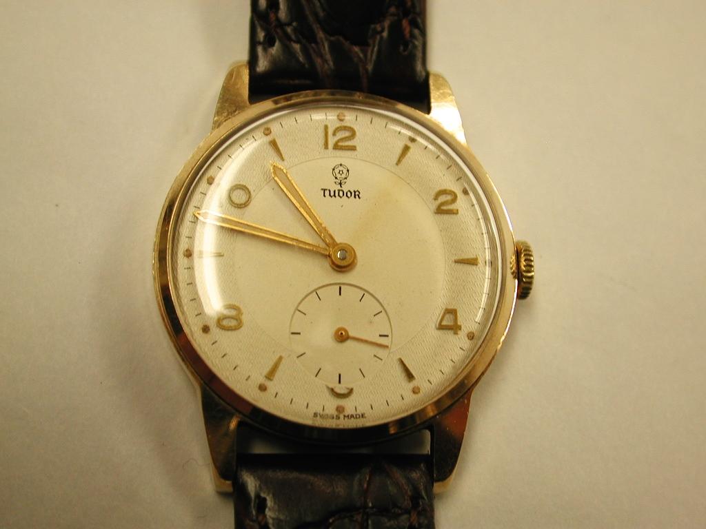 9ct Gold Tudor Watch with 15 Ruby Tudor Movement and Dennison Case, 1953
Nice authentic vintage watch on new leather strap.